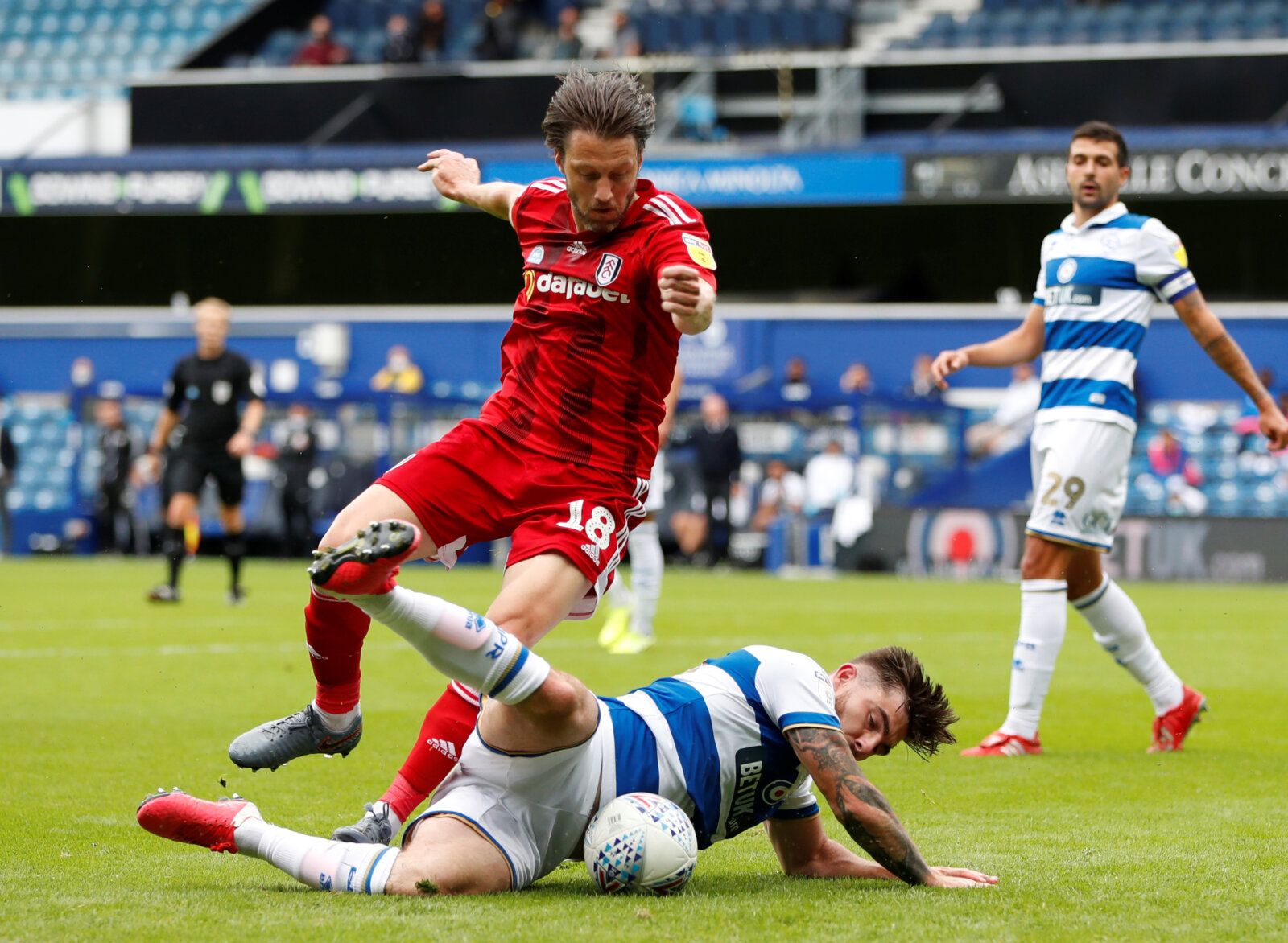 Soccer Football - Championship - Queens Park Rangers v Fulham - Loftus Road, London, Britain - June 30, 2020  QPR’s Ryan Manning in action with Fulham’s Harry Arter, as play resumes behind closed doors following the outbreak of the coronavirus disease (COVID-19)  Action Images/Paul Childs  EDITORIAL USE ONLY. No use with unauthorized audio, video, data, fixture lists, club/league logos or 