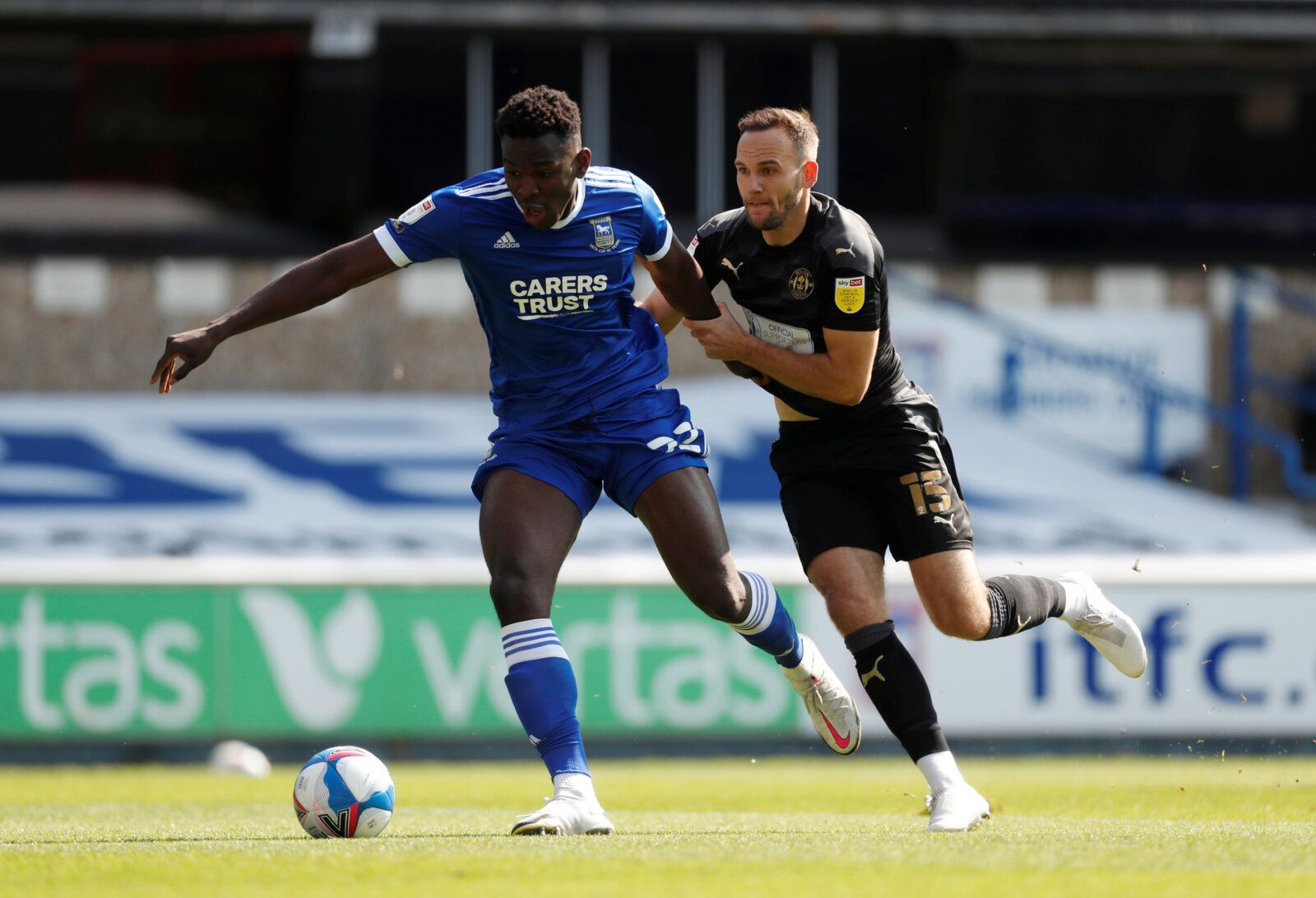 Soccer Football - League One - Ipswich Town v Wigan Athletic - Portman Road, Ipswich, Britain - September 13, 2020   Ipswich Town’s Aristote Nsiala in action with Wigan’s Dan Gardner   Action Images/Matthew Childs    EDITORIAL USE ONLY. No use with unauthorized audio, video, data, fixture lists, club/league logos or 