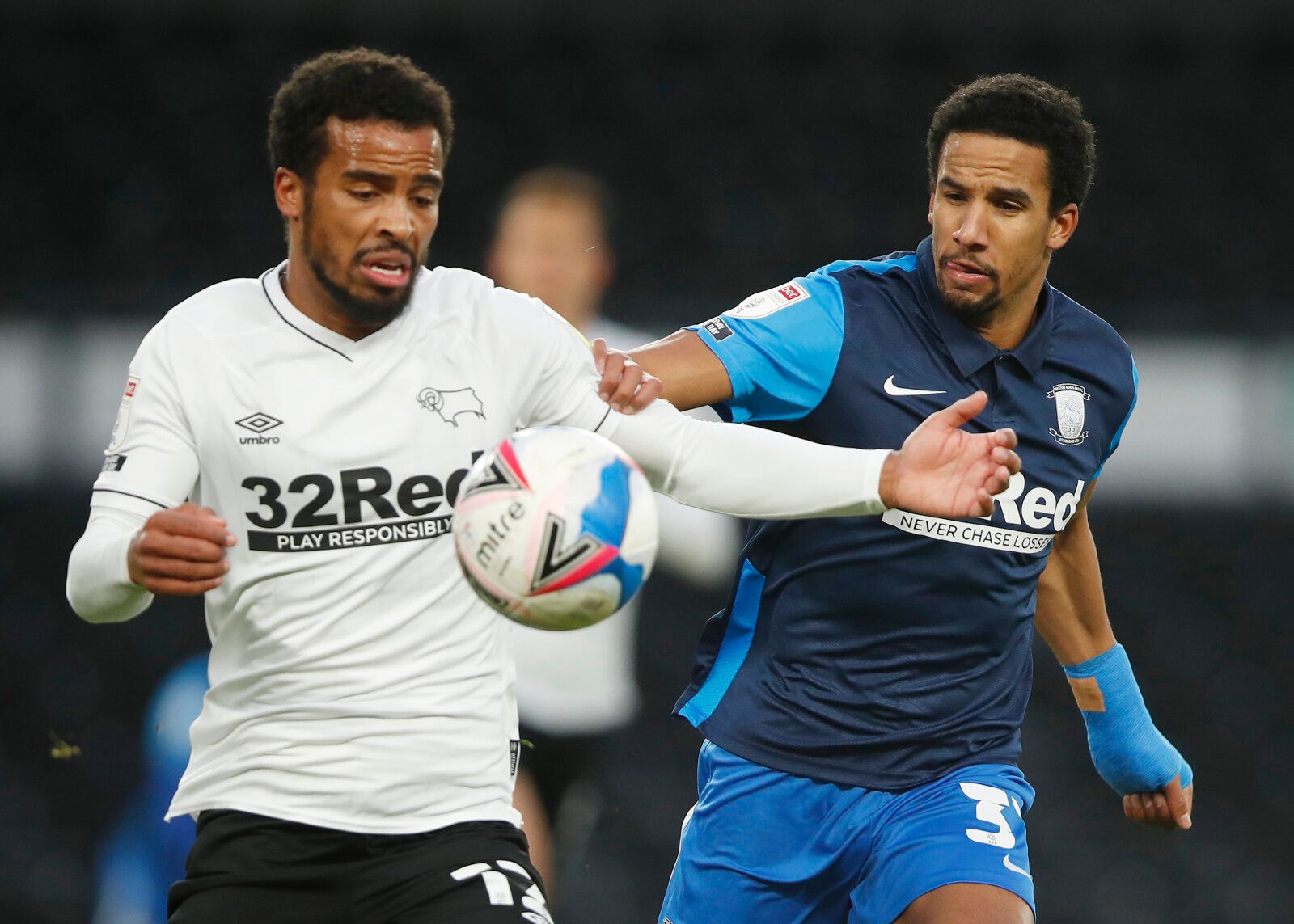 Soccer Football - Championship - Derby County v Preston North End - Pride Park, Derby, Britain - December 26, 2020 Preston North End's Scott Sinclair in action with Derby County's Nathan Byrne Action Images/Molly Darlington EDITORIAL USE ONLY. No use with unauthorized audio, video, data, fixture lists, club/league logos or 'live' services. Online in-match use limited to 75 images, no video emulation. No use in betting, games or single club /league/player publications.  Please contact your accoun