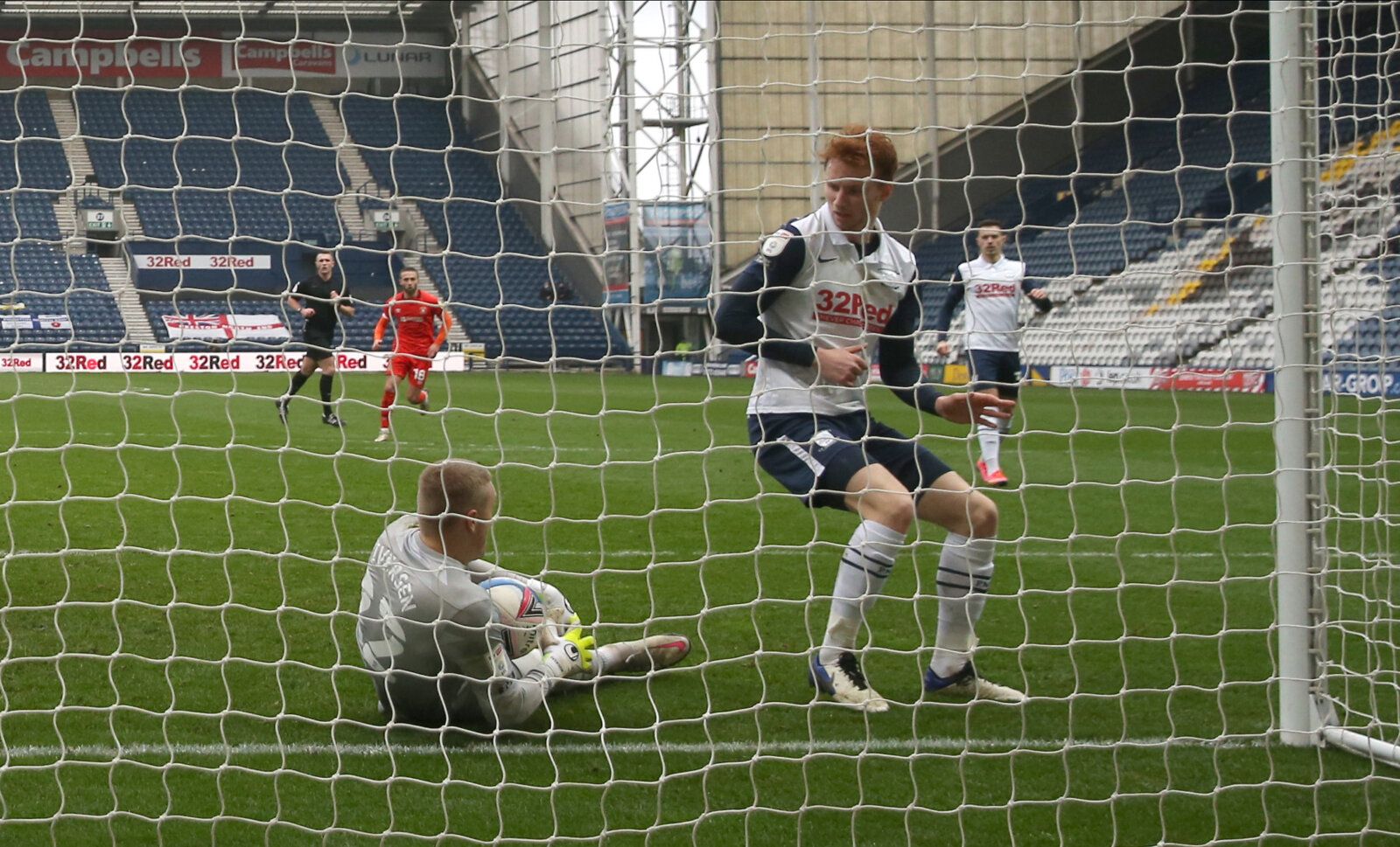 Soccer Football - Championship - Preston North End v Luton Town - Deepdale, Preston, Britain - March 20, 2021 Preston North End's Daniel Iversen scores an own goal and Luton Town's first Action Images/Jason Cairnduff EDITORIAL USE ONLY. No use with unauthorized audio, video, data, fixture lists, club/league logos or 'live' services. Online in-match use limited to 75 images, no video emulation. No use in betting, games or single club /league/player publications.  Please contact your account repre