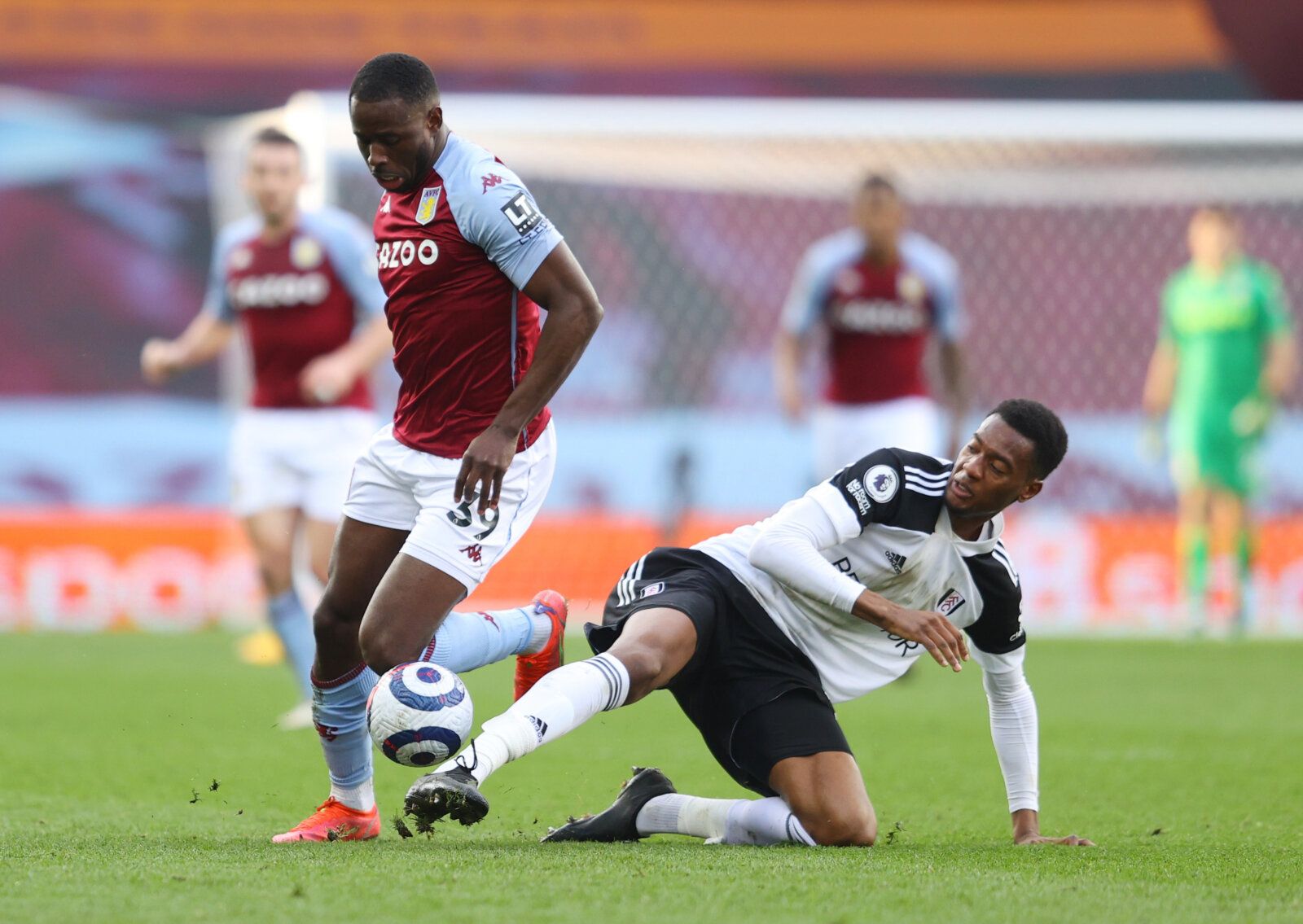 Soccer Football - Premier League - Aston Villa v Fulham - Villa Park, Birmingham, Britain - April 4, 2021 Aston Villa's Keinan Davis in action with Fulham's Tosin Adarabioyo Pool via REUTERS/Richard Heathcote EDITORIAL USE ONLY. No use with unauthorized audio, video, data, fixture lists, club/league logos or 'live' services. Online in-match use limited to 75 images, no video emulation. No use in betting, games or single club /league/player publications.  Please contact your account representativ