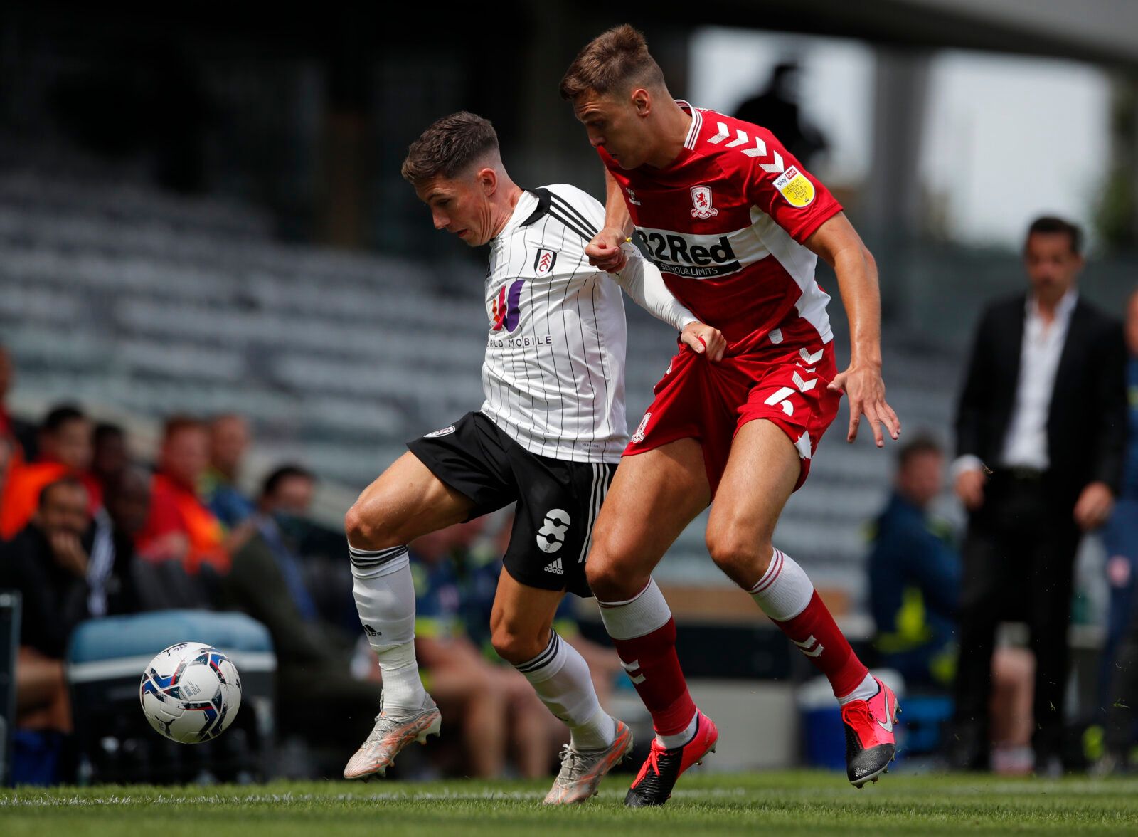 Soccer Football - Championship - Fulham v Middlesbrough - Craven Cottage, London, Britain - August 8, 2021 Fulham’s Harry Wilson in action with Middlesbrough's Dael Fry Action Images/Andrew Couldridge