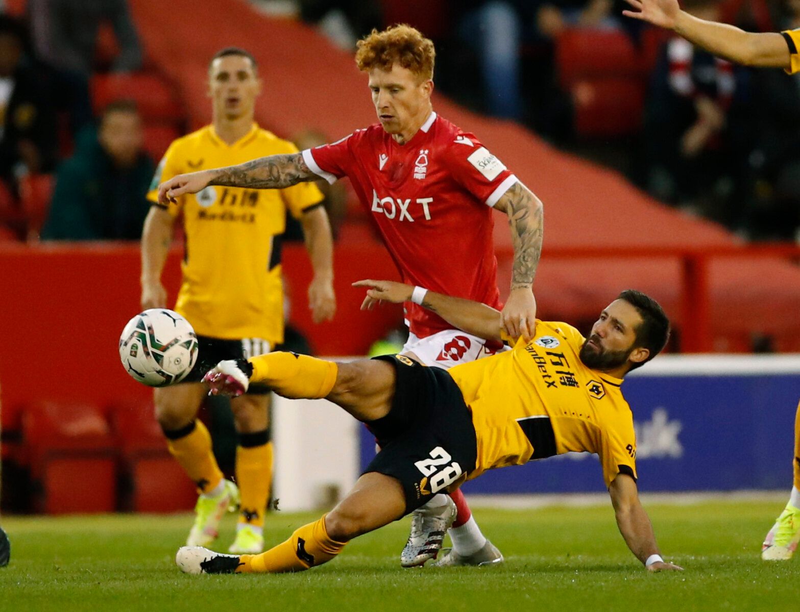Soccer - England - Carabao Cup Second Round - Nottingham Forest v Wolverhampton Wanderers - The City Ground, Nottingham, Britain - August 24, 2021 Nottingham Forest's Jack Colback in action with Wolverhampton Wanderers' Joao Moutinho Action Images via Reuters/Andrew Boyers
