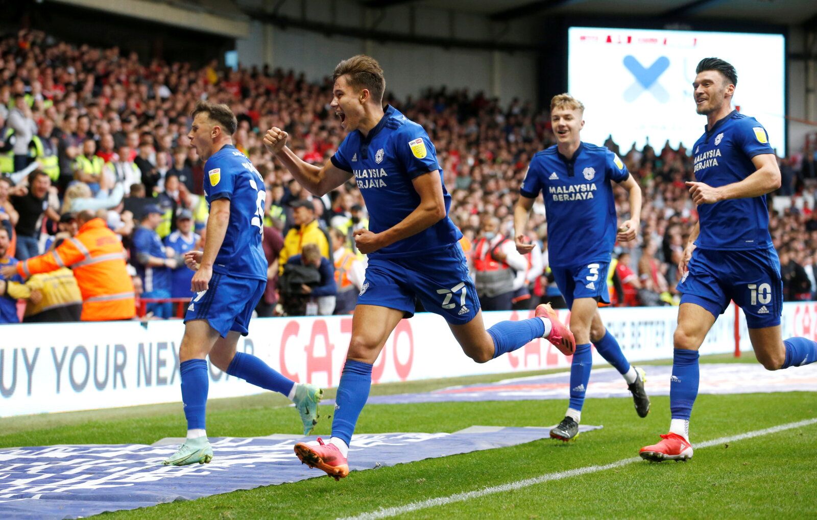Soccer Football - Championship - Nottingham Forest v Cardiff City - The City Ground, Nottingham, Britain - September 12, 2021  Cardiff City's Ruben Colwill celebrates scoring their second goal with teammates      Action Images/Ed Sykes