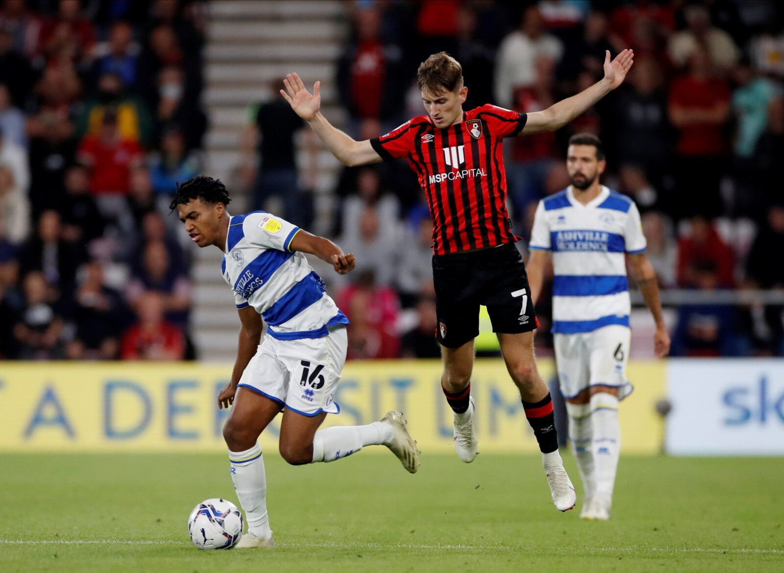 Soccer Football - Championship - AFC Bournemouth v Queens Park Rangers - Vitality Stadium, Bournemouth, Britain - September 14, 2021 Queens Park Rangers' Sam McCallum in action with AFC Bournemouth's David Brooks Action Images/Paul Childs