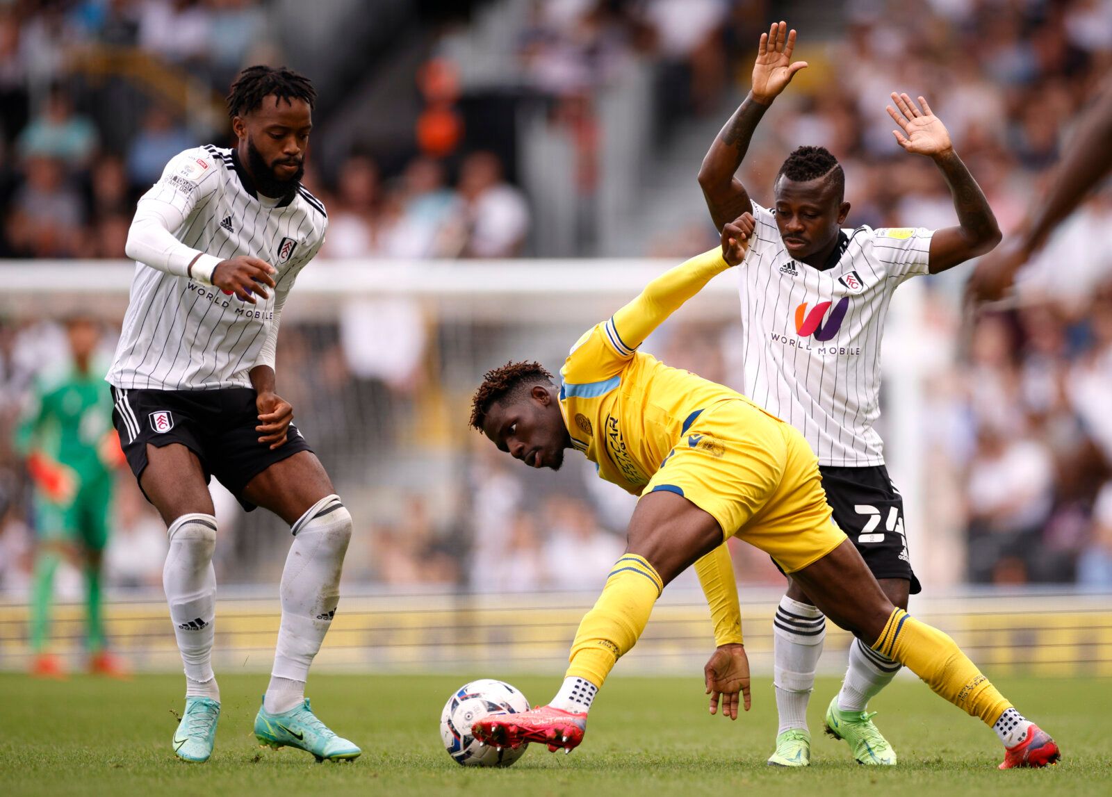Soccer Football - Championship - Fulham v Reading - Craven Cottage, London, Britain - September 18, 2021 Reading's Tom Dele-Bashiru in action with Fulham’s Nathaniel Chalobah and Jean Michael Seri Action Images/John Sibley EDITORIAL USE ONLY. No use with unauthorized audio, video, data, fixture lists, club/league logos or 'live' services. Online in-match use limited to 75 images, no video emulation. No use in betting, games or single club /league/player publications.  Please contact your account