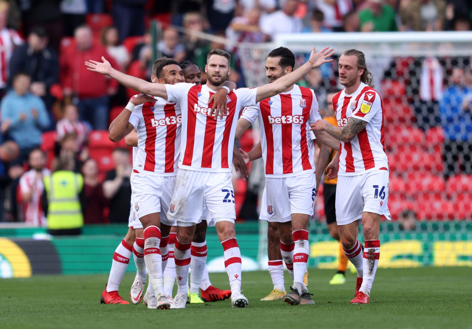 Soccer Football - England - Championship - Stoke City v Hull City - bet365 Stadium, Stoke-on-Trent, Britain - September 25, 2021  Stoke City's Nick Powell celebrates scoring their second goal with teammates  Action Images/John Clifton   EDITORIAL USE ONLY. No use with unauthorized audio, video, data, fixture lists, club/league logos or 