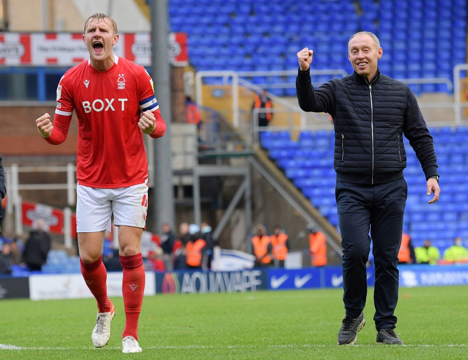Soccer Football - Championship - Birmingham City v Nottingham Forest - St Andrew's, Birmingham, Britain - October 2, 2021  Nottingham Forest's Joe Worrall celebrates with manager Steve Cooper at full time  Action Images/Paul Burrows  EDITORIAL USE ONLY. No use with unauthorized audio, video, data, fixture lists, club/league logos or 