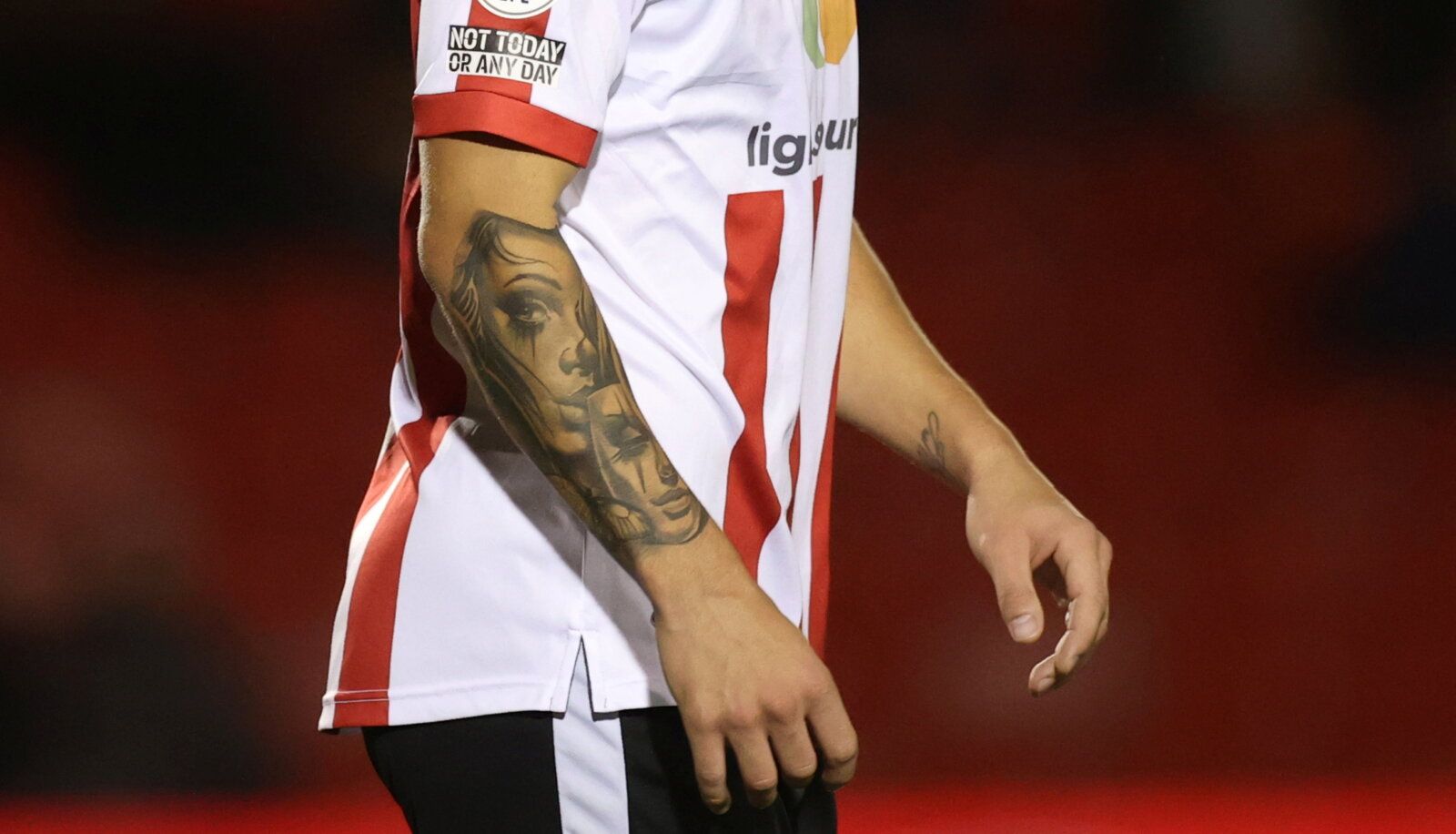 Soccer Football - EFL Trophy - Group Stage - Lincoln City v Sunderland - Sincil Bank, Lincoln, Britain - October 5, 2021  General view of Lincoln City's Lewis Montsma's tattoo   Action Images/Lee Smith  EDITORIAL USE ONLY. No use with unauthorized audio, video, data, fixture lists, club/league logos or 