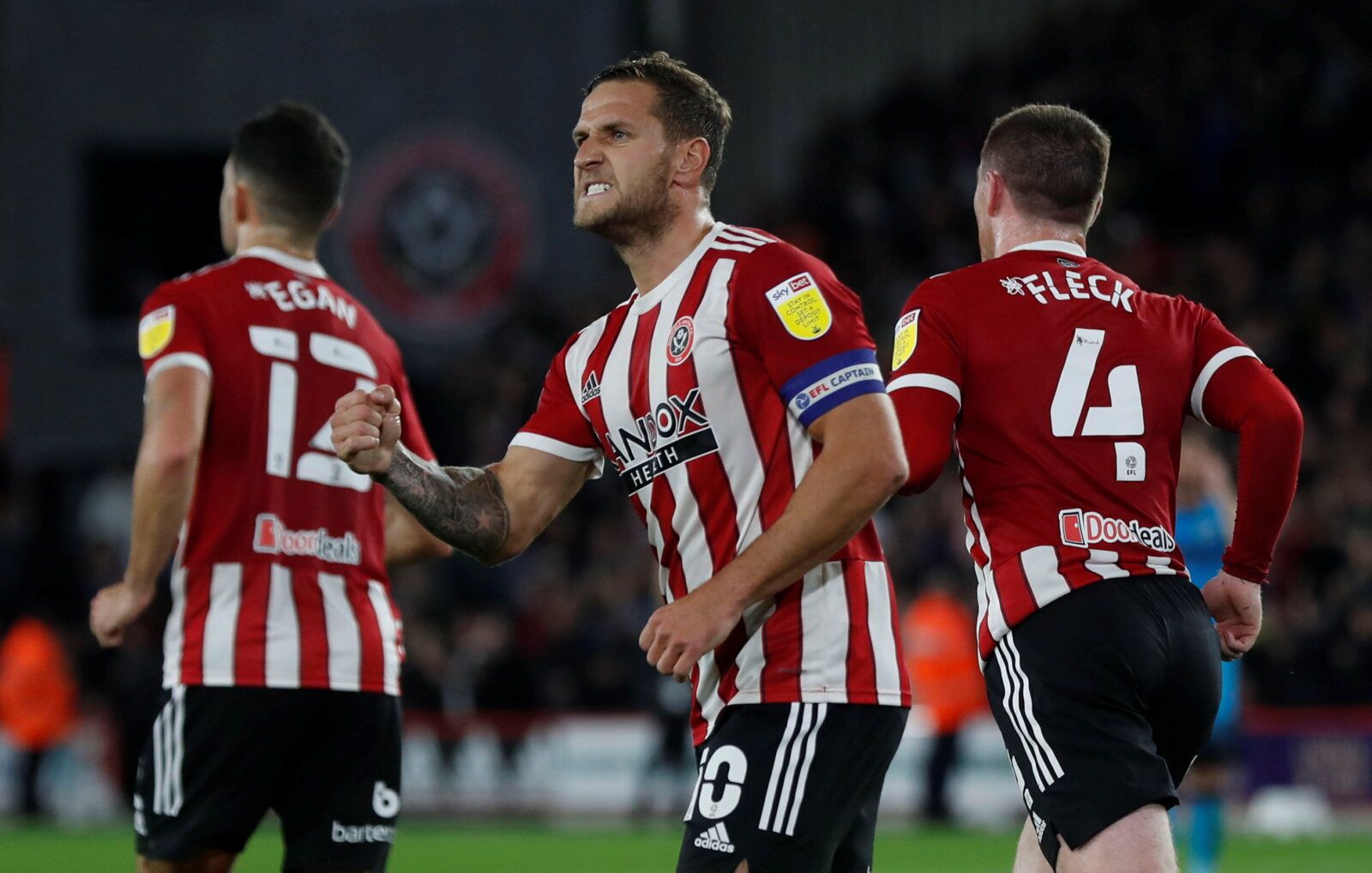 Soccer Football - Championship - Sheffield United v Millwall - Bramall Lane, Sheffield, Britain - October 19, 2021 Sheffield United’s Billy Sharp celebrates scoring their first goal with teammates   Action Images/Lee Smith  EDITORIAL USE ONLY. No use with unauthorized audio, video, data, fixture lists, club/league logos or "live" services. Online in-match use limited to 75 images, no video emulation. No use in betting, games or single club/league/player publications.  Please contact your account