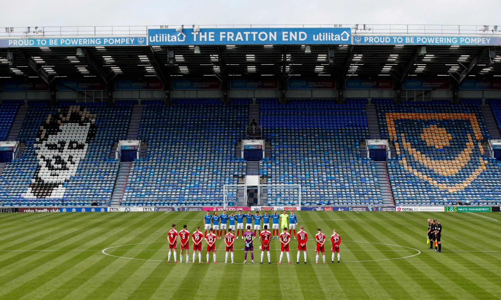 Soccer Football - League One - Portsmouth v Accrington Stanley - Fratton Park, Portsmouth, Britain - May 9, 2021 General view during a minute's silence in memory of former player Alan McLoughlin before kick off Action Images/Andrew Boyers EDITORIAL USE ONLY. No use with unauthorized audio, video, data, fixture lists, club/league logos or 'live' services. Online in-match use limited to 75 images, no video emulation. No use in betting, games or single club /league/player publications.  Please cont