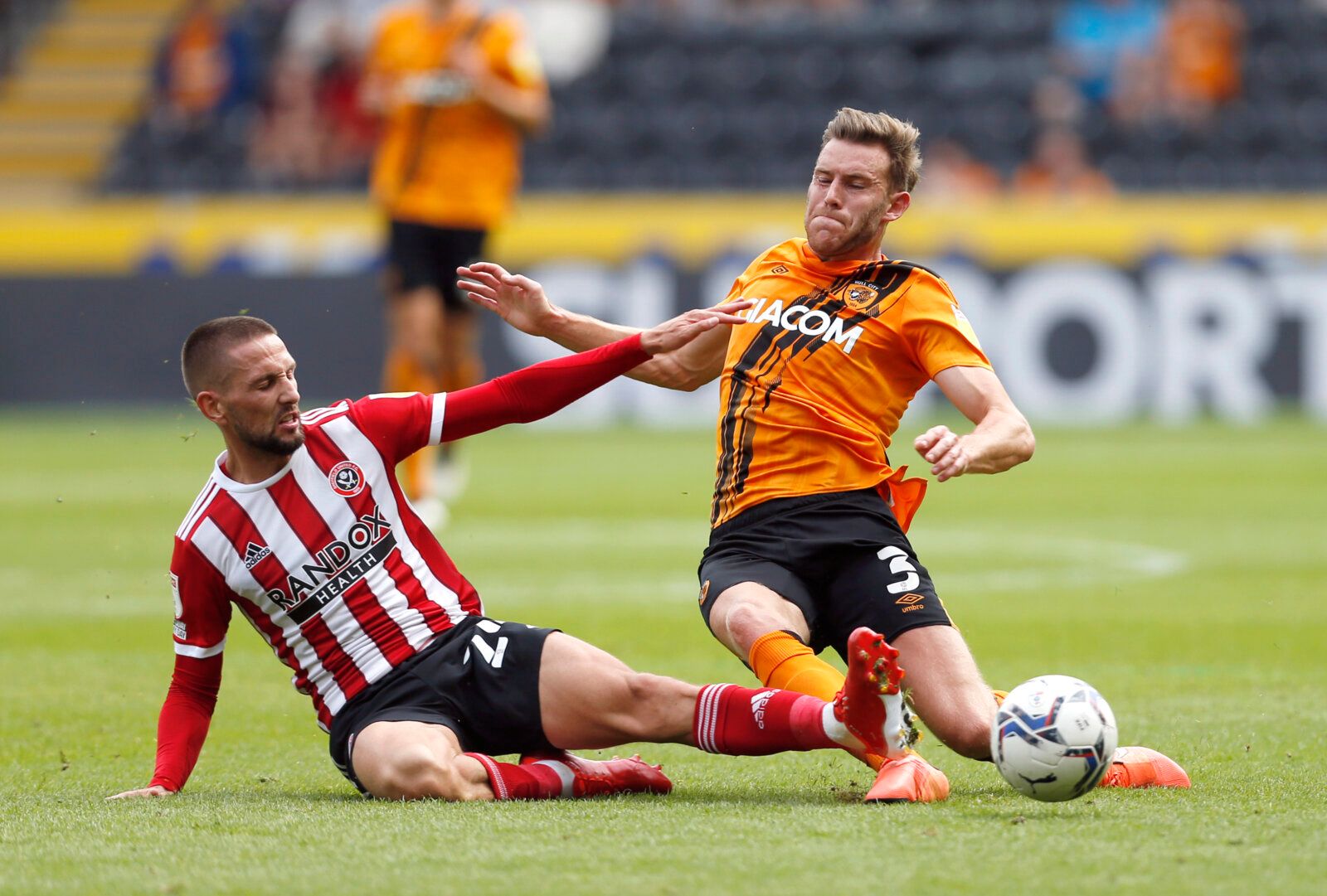 Soccer Football - Championship - Hull City v Sheffield United - KCOM Stadium, Hull, Britain - September 18, 2021 Sheffield United's Connor Hourihane in action with Hull City's Callum Elder Action Images/Ed Sykes EDITORIAL USE ONLY. No use with unauthorized audio, video, data, fixture lists, club/league logos or 'live' services. Online in-match use limited to 75 images, no video emulation. No use in betting, games or single club /league/player publications.  Please contact your account representa