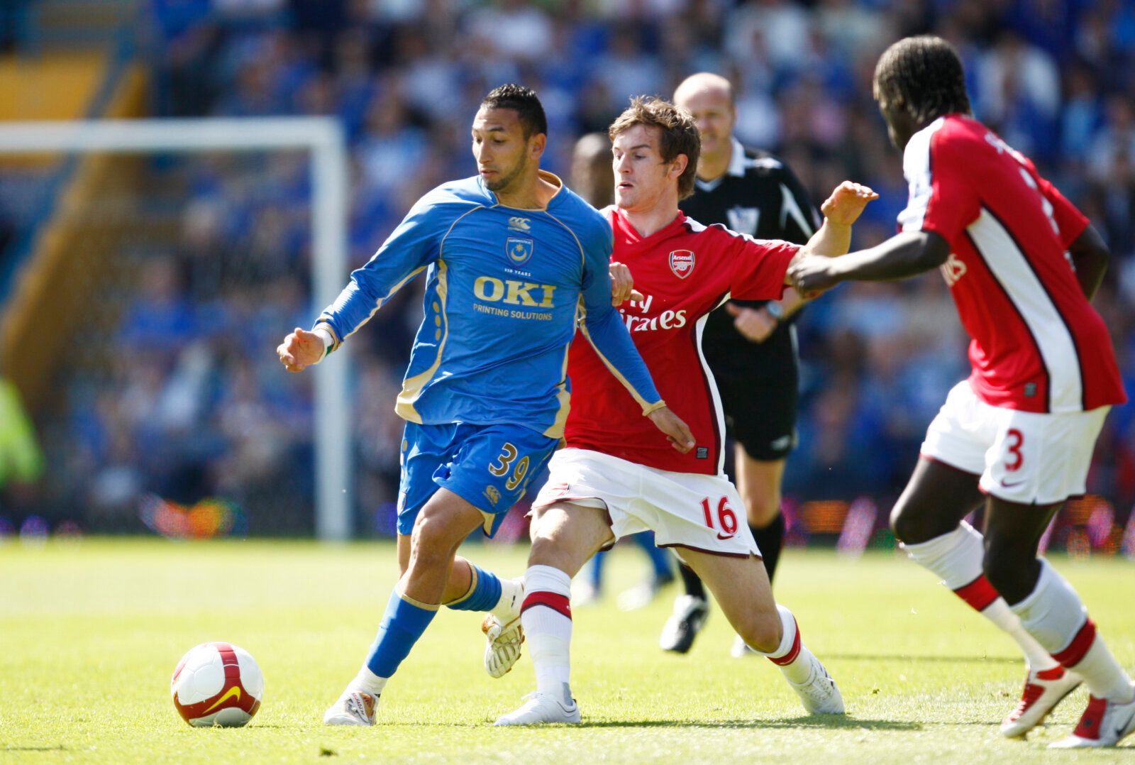 Football - Portsmouth v Arsenal Barclays Premier League  - Fratton Park - 2/5/09 
Aaron Ramsey of Arsenal &amp; Nadir Belhadj of Portsmouth 
Mandatory Credit: Action Images / Paul Harding 
Livepic 
NO ONLINE/INTERNET USE WITHOUT A LICENCE FROM THE FOOTBALL DATA CO LTD. FOR LICENCE ENQUIRIES PLEASE TELEPHONE +44 (0) 207 864 9000.