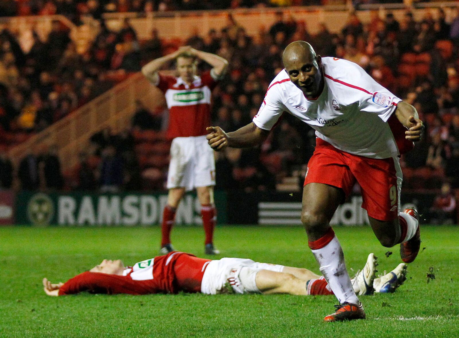 Football - Middlesbrough v Nottingham Forest npower Football League Championship - Riverside Stadium - 10/11 - 1/3/11 
Dele Adebola (R) celebrates scoring Nottingham Forest's first goal as Middlesbrough players look dejected 
Mandatory Credit: Action Images / Lee Smith 
Livepic