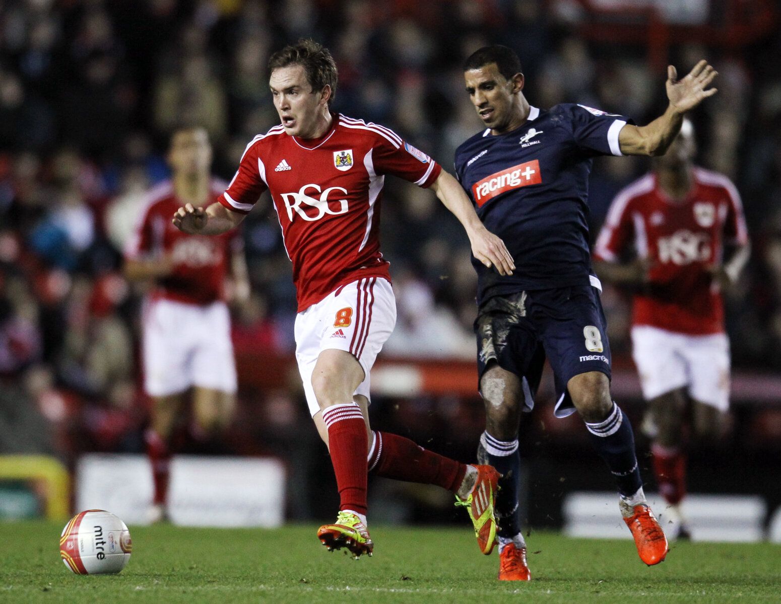 Football - Bristol City v Millwall - npower Football League Championship  - Ashton Gate  - 11/12 - 3/1/12 
Bristol City's Neil Kilkenny (L) and Millwall's Hameur Bouazza in action 
Mandatory Credit: Action Images / Andrew Couldridge 
EDITORIAL USE ONLY. No use with unauthorized audio, video, data, fixture lists, club/league logos or live services. Online in-match use limited to 45 images, no video emulation. No use in betting, games or single club/league/player publications.  Please contact your