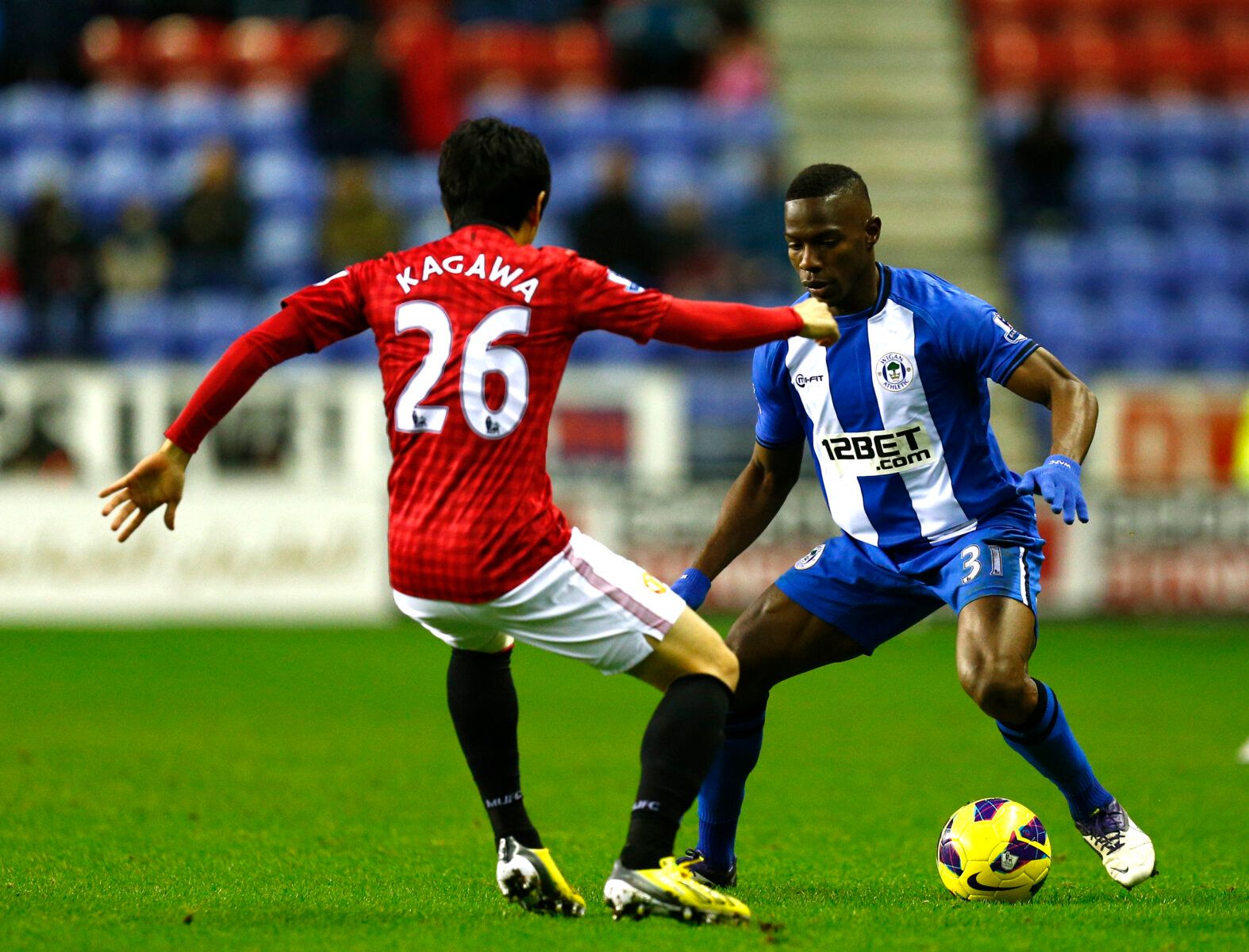 Football - Wigan Athletic v Manchester United - Barclays Premier League - DW Stadium - 12/13 - 1/1/13 
Wigan Athletic's Maynor Figueroa (R) in action 
Mandatory Credit: Action Images / Jason Cairnduff 
EDITORIAL USE ONLY. No use with unauthorized audio, video, data, fixture lists, club/league logos or live services. Online in-match use limited to 45 images, no video emulation. No use in betting, games or single club/league/player publications.  Please contact your account representative for furt