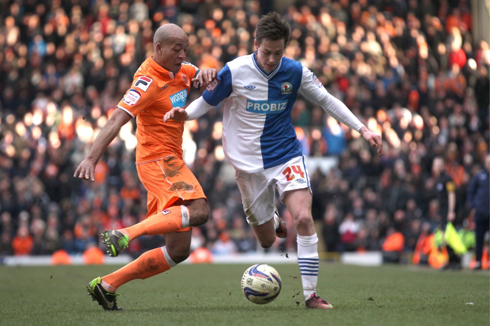 Football - Blackburn Rovers v Blackpool - npower Football League Championship  - Ewood Park - 12/13 - 29/3/13 
Blackburn's Josh Morris in action against Blackpool's Alex Baptiste  
Mandatory Credit: Action Images / Carl Recine 
EDITORIAL USE ONLY. No use with unauthorized audio, video, data, fixture lists, club/league logos or live services. Online in-match use limited to 45 images, no video emulation. No use in betting, games or single club/league/player publications.  Please contact your accou