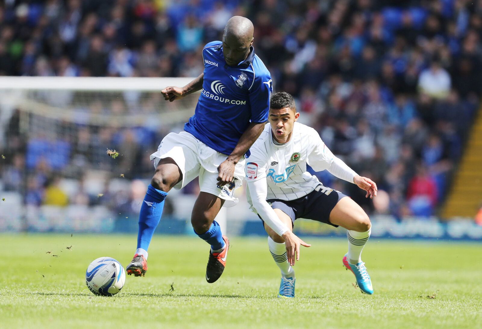 Football - Birmingham City v Blackburn Rovers - npower Football League Championship - St Andrews - 4/5/13 
Morgaro Gomis of Birmingham City (L) in action with Cameron Stewart of Blackburn Rovers  
Mandatory Credit: Action Images / John Clifton 
Livepic 
EDITORIAL USE ONLY. No use with unauthorized audio, video, data, fixture lists, club/league logos or live services. Online in-match use limited to 45 images, no video emulation. No use in betting, games or single club/league/player publications. 