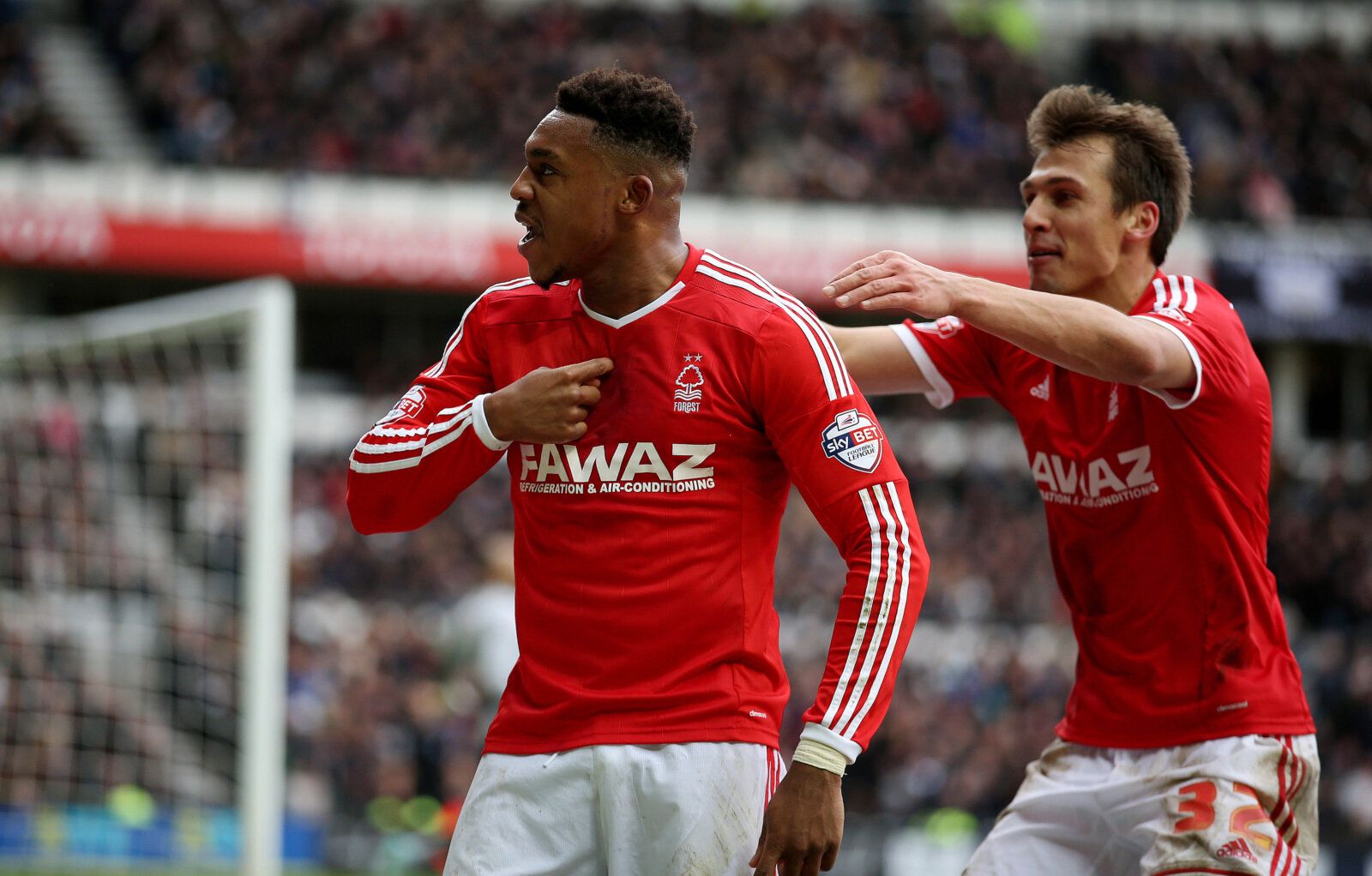 Football - Derby County v Nottingham Forest - Sky Bet Football League Championship - iPro Stadium - 17/1/15 
Nottingham Forest's Britt Assombalonga celebrates scoring his sides first goal 
Mandatory Credit: Action Images / Steven Paston 
Livepic 
EDITORIAL USE ONLY. No use with unauthorized audio, video, data, fixture lists, club/league logos or 