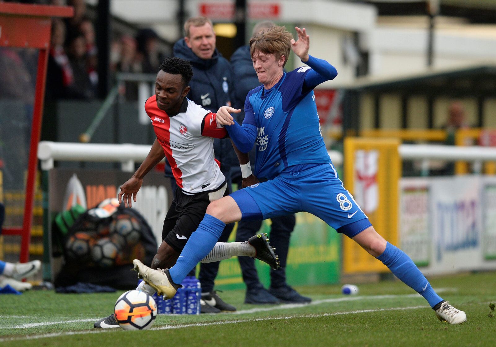 Soccer Football - FA Cup Second Round - Woking vs Peterborough United - The Laithwaite Community Stadium, Woking, Britain - December 3, 2017  Peterborough's Chris Forrester in action with Woking's Regan Charles-Cook   Action Images/Alan Walter