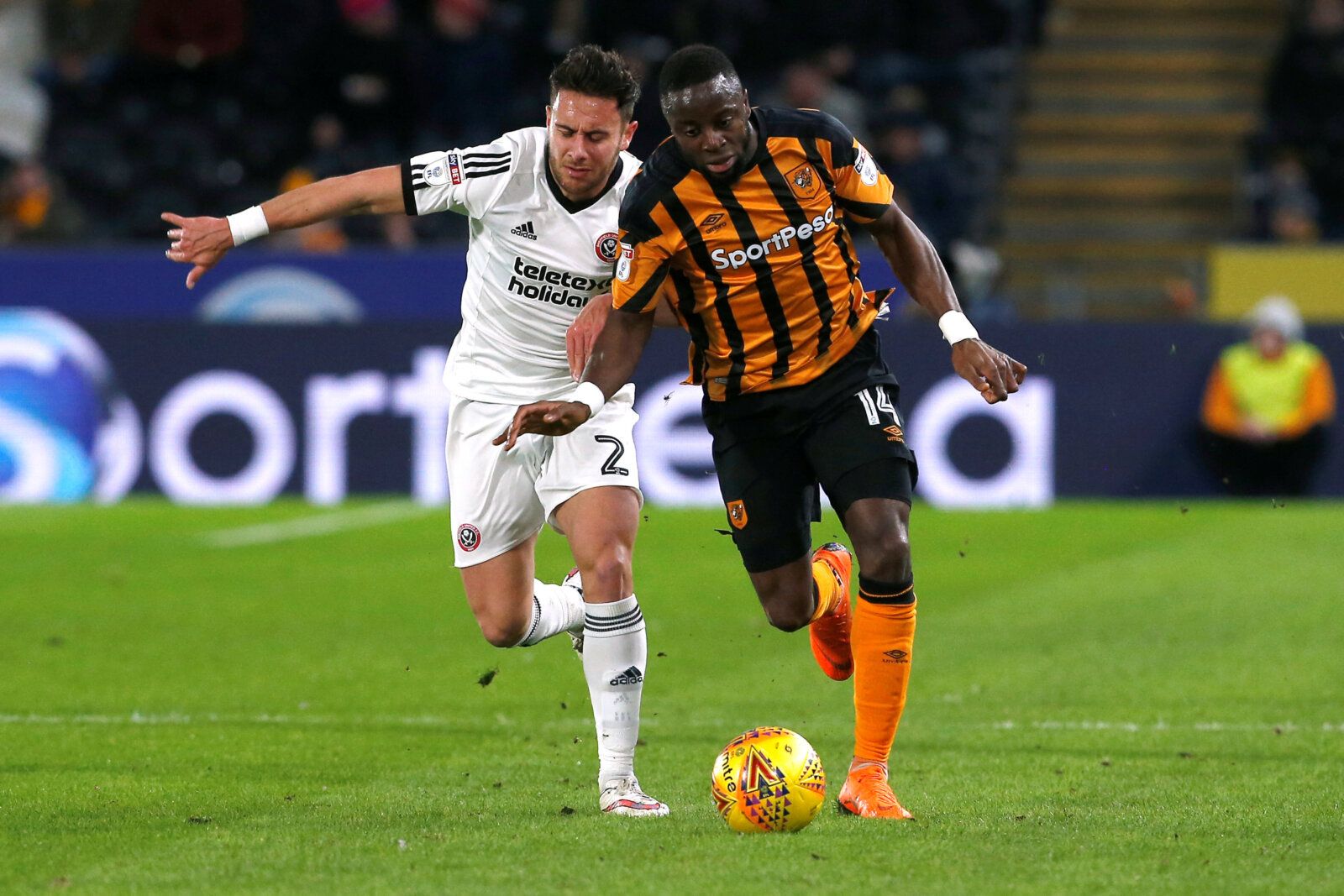 Soccer Football - Championship - Hull City vs Sheffield United - KCOM Stadium, Hull, Britain - February 23, 2018   Sheffield United's George Baldock in action with Hull City's Adama Diomande   Action Images/Craig Brough    EDITORIAL USE ONLY. No use with unauthorized audio, video, data, fixture lists, club/league logos or 