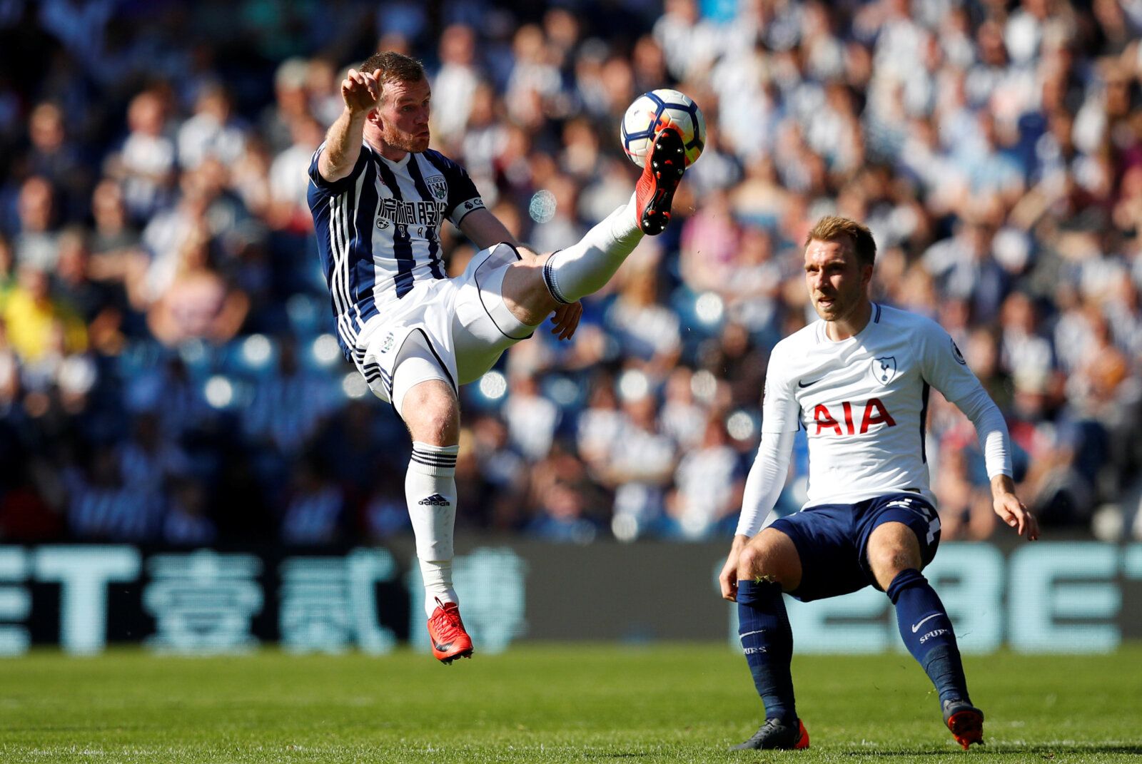 Soccer Football - Premier League - West Bromwich Albion vs Tottenham Hotspur - The Hawthorns, West Bromwich, Britain - May 5, 2018   West Bromwich Albion's Chris Brunt in action with Tottenham's Christian Eriksen            REUTERS/Phil Noble    EDITORIAL USE ONLY. No use with unauthorized audio, video, data, fixture lists, club/league logos or 