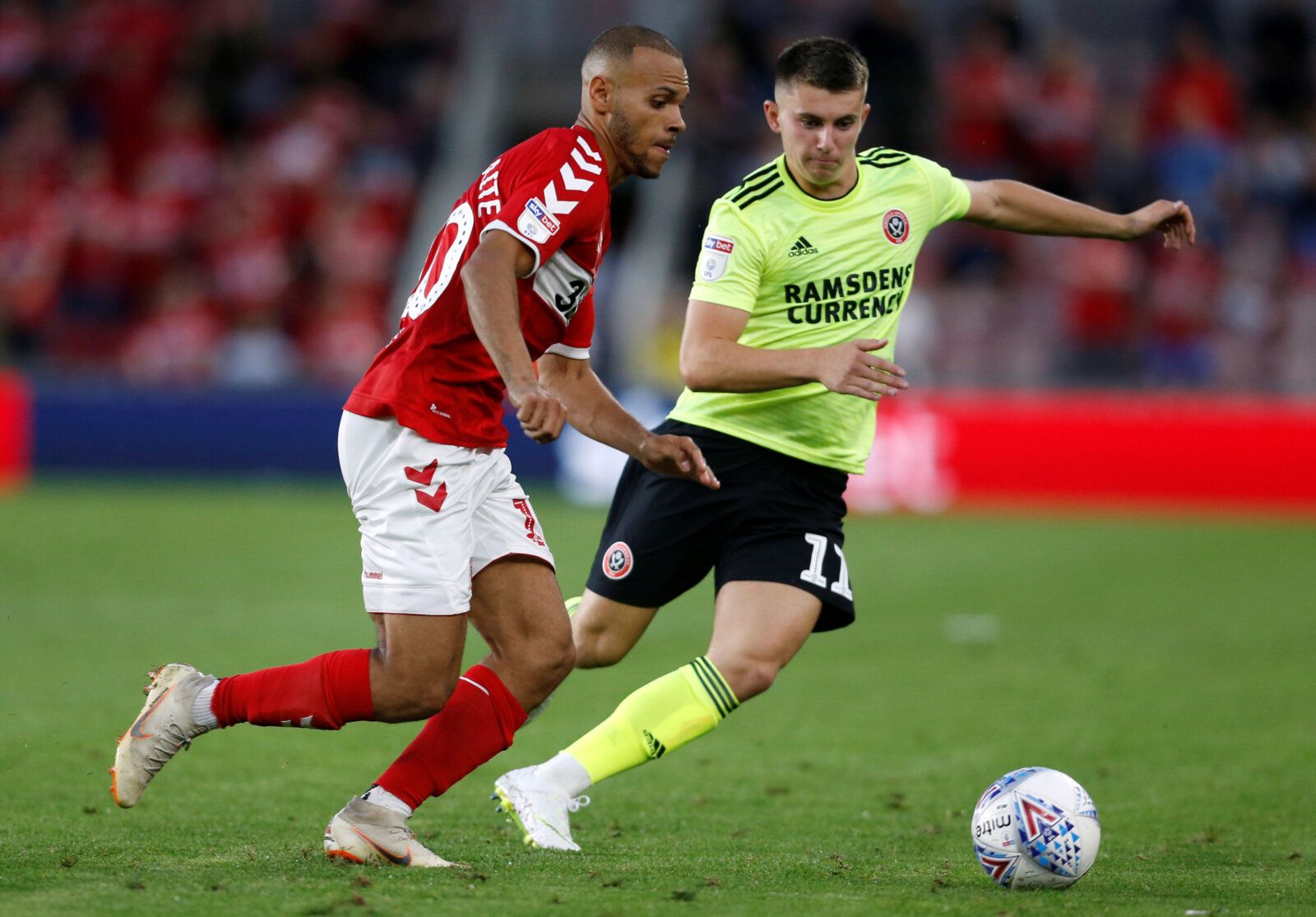 Soccer Football - Championship - Middlesbrough v Sheffield United - Riverside Stadium, Middlesbrough, Britain - August 7, 2018   Middlesbrough's Martin Braithwaite in action with Sheffield United's Ben Woodburn    Action Images/Ed Sykes    EDITORIAL USE ONLY. No use with unauthorized audio, video, data, fixture lists, club/league logos or 