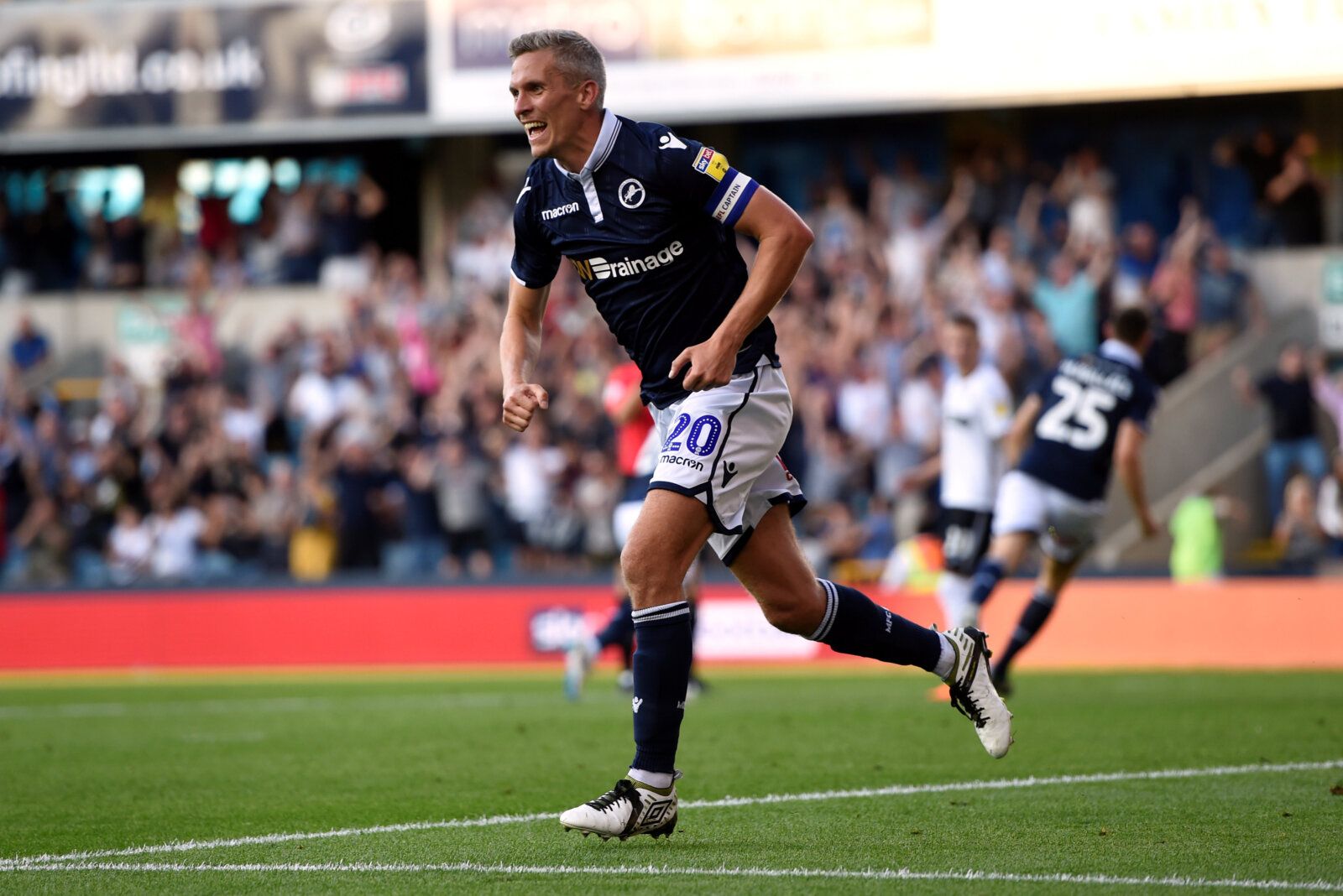 Soccer Football - Championship - Millwall v Swansea City - The Den, London, Britain - September 1, 2018  Millwall's Steve Morison celebrates their first goal scored by Murray Walace     Action Images/Adam Holt  EDITORIAL USE ONLY. No use with unauthorized audio, video, data, fixture lists, club/league logos or 