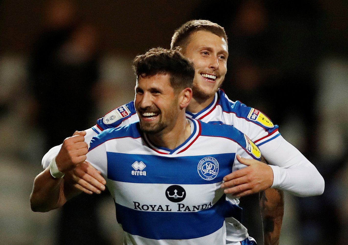 Soccer Football - Championship - Queens Park Rangers v Aston Villa - Loftus Road, London, Britain - October 26, 2018   QPR's Pawel Wszolek and Luke Freeman celebrate at full time   Action Images/Paul Childs    EDITORIAL USE ONLY. No use with unauthorized audio, video, data, fixture lists, club/league logos or 