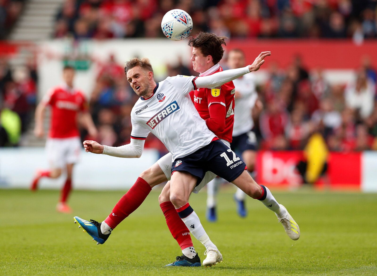 Soccer Football - Championship - Nottingham Forest v Bolton Wanderers - The City Ground, Nottingham, Britain - May 5, 2019   Nottingham Forest's Sam Byram in action with Bolton Wanderers' Craig Noone   Action Images/Peter Cziborra    EDITORIAL USE ONLY. No use with unauthorized audio, video, data, fixture lists, club/league logos or 