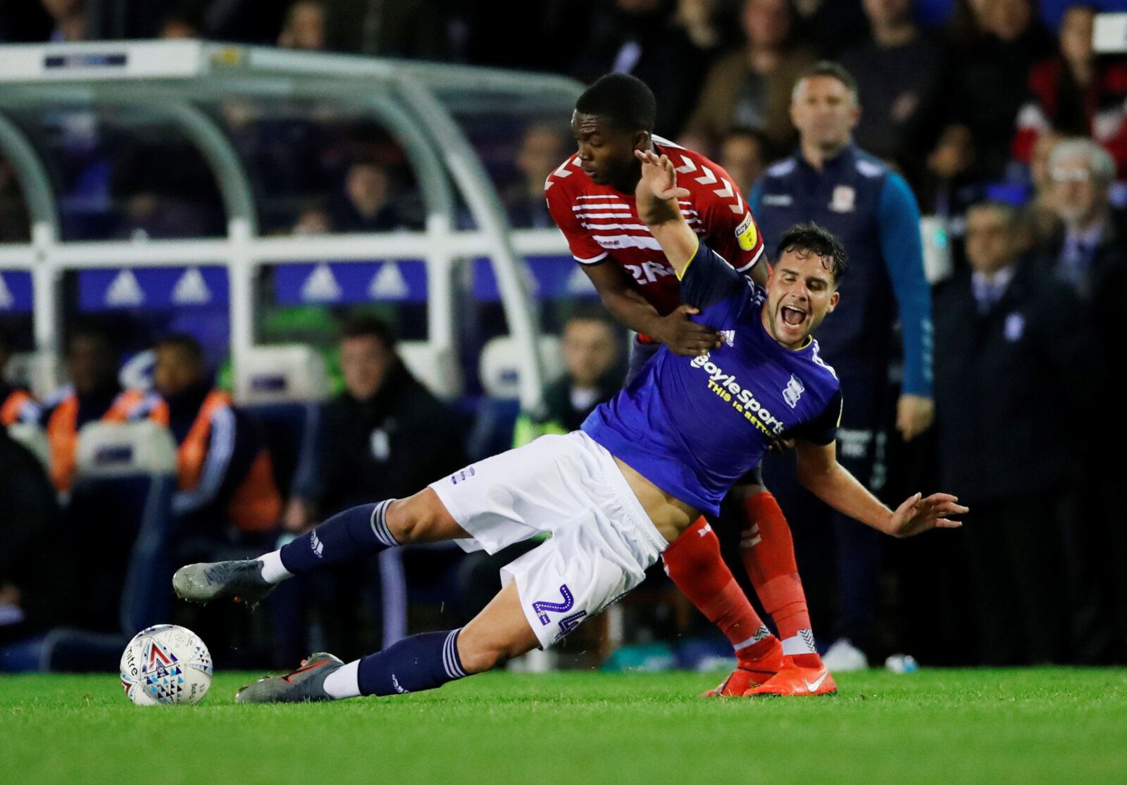 Soccer Football - Championship - Birmingham City v Middlesbrough - St Andrew's, Birmingham, Britain -October 4, 2019   Middlesbrough's Anfernee Dijksteel fouls Birmingham's Alvaro Gimenez and is subsequently shown a yellow card   Action Images/Andrew Boyers    EDITORIAL USE ONLY. No use with unauthorized audio, video, data, fixture lists, club/league logos or 
