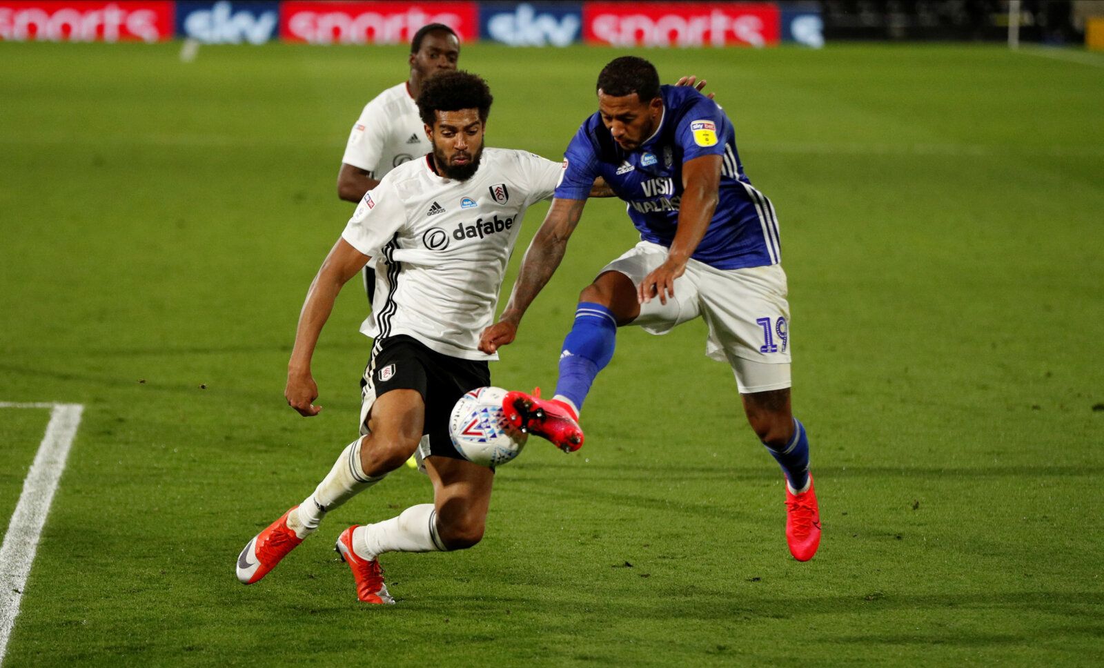 Soccer Football - Championship - Fulham v Cardiff City - Craven Cottage, London, Britain - July 10, 2020  Cardiff City's Nathaniel Mendez-Laing in action with Fulham’s Cyrus Christie, as play resumes behind closed doors following the outbreak of the coronavirus disease (COVID-19)  Action Images/John Sibley  EDITORIAL USE ONLY. No use with unauthorized audio, video, data, fixture lists, club/league logos or 