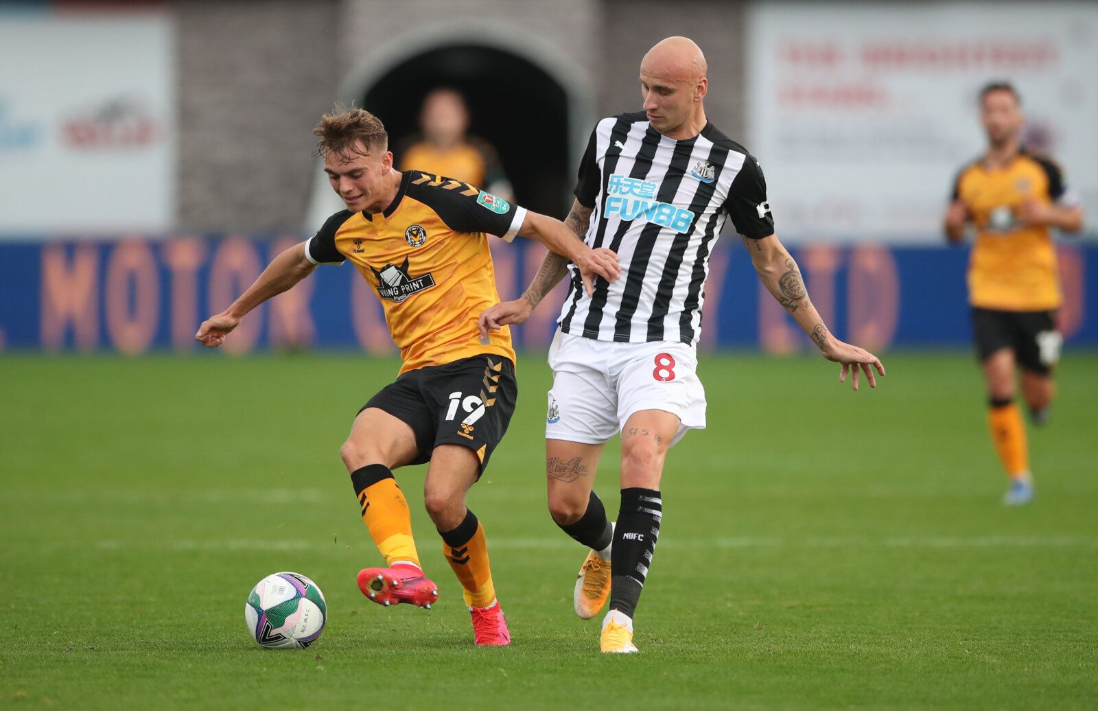 Soccer Football - Carabao Cup Fourth Round - Newport County AFC v Newcastle United - Rodney Parade, Newport, Wales, Britain - September 30, 2020 Newport County's Scott Twine in action with Newcastle United's Jonjo Shelvey Pool via REUTERS/Nick Potts EDITORIAL USE ONLY. No use with unauthorized audio, video, data, fixture lists, club/league logos or 'live' services. Online in-match use limited to 75 images, no video emulation. No use in betting, games or single club /league/player publications.  