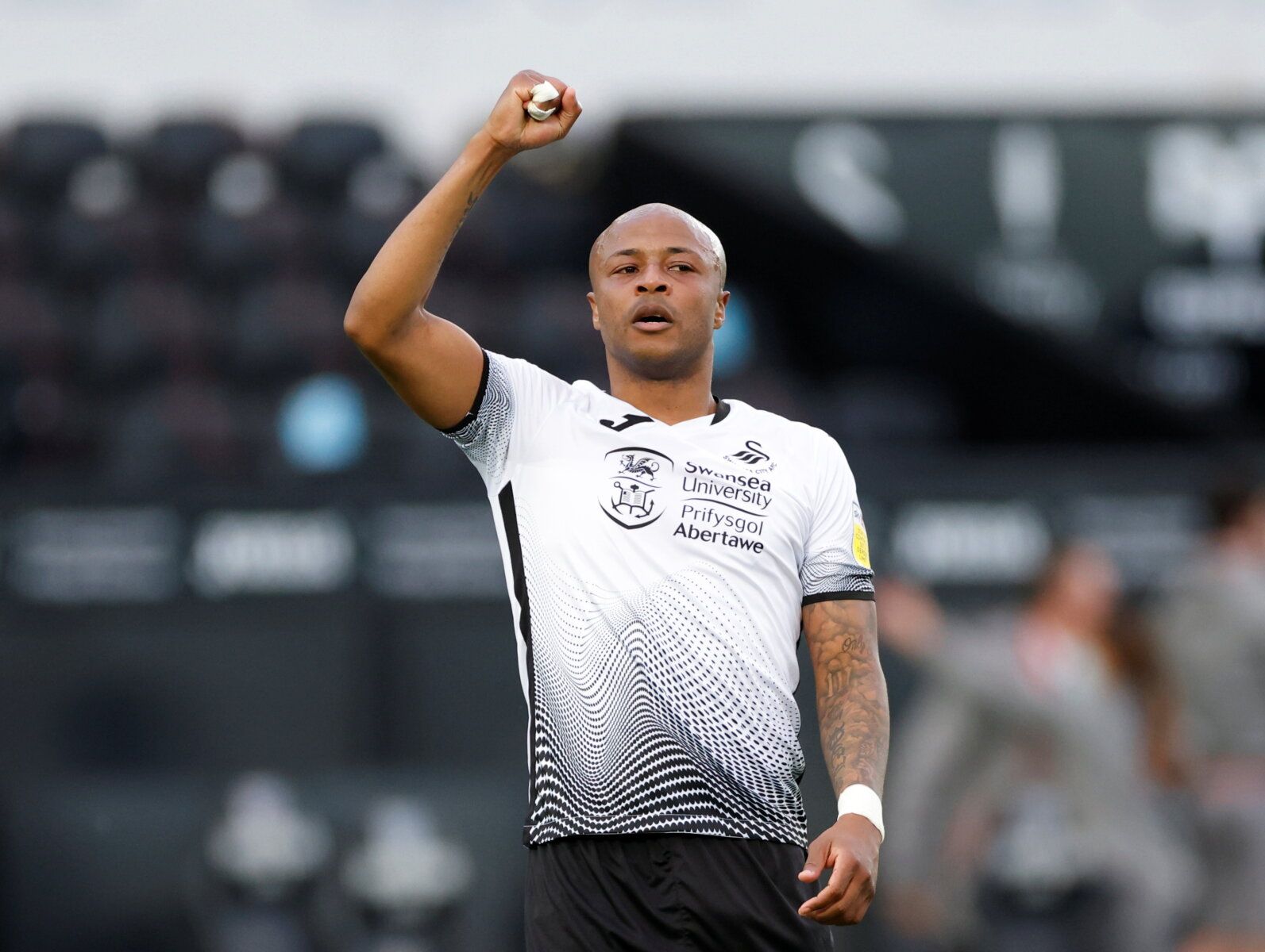 Soccer Football - Championship Play-Off Semi Final Second Leg - Swansea City v Barnsley - Liberty Stadium, Swansea, Britain - May 22, 2021  Swansea City's Andre Ayew celebrates after the match Action Images via Reuters/John Sibley    EDITORIAL USE ONLY. No use with unauthorized audio, video, data, fixture lists, club/league logos or 