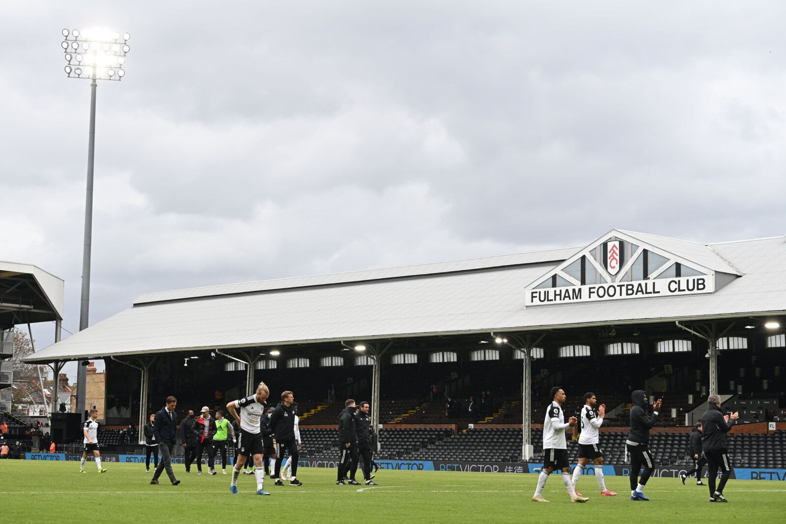 Soccer Football - Premier League - Fulham v Newcastle United - Craven Cottage, London, Britain - May 23, 2021 General view as Fulham players applaud fans after the match, as a limited number of fans are permitted at outdoor sports venues Pool via REUTERS/Glyn Kirk EDITORIAL USE ONLY. No use with unauthorized audio, video, data, fixture lists, club/league logos or 'live' services. Online in-match use limited to 75 images, no video emulation. No use in betting, games or single club /league/player 