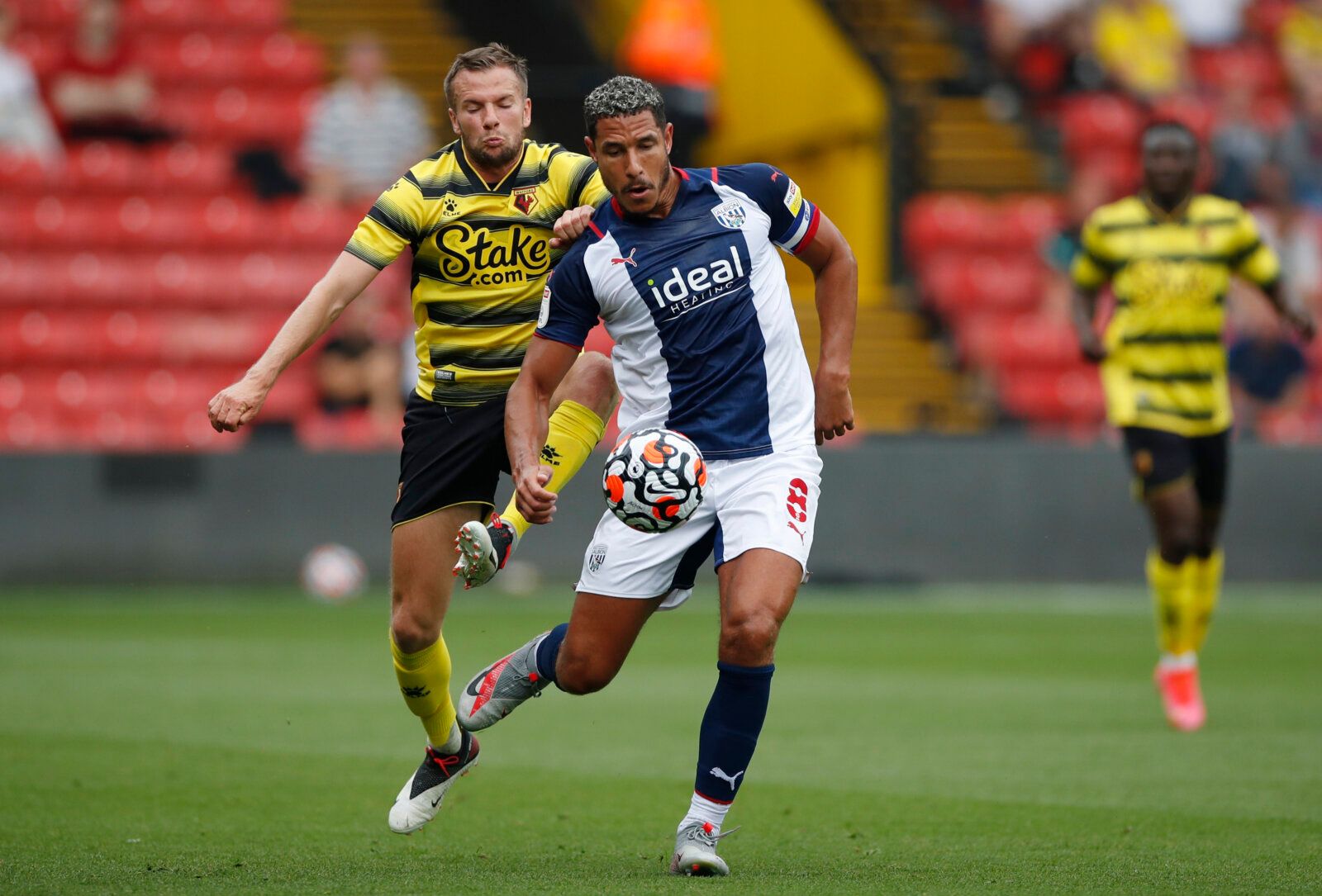 Soccer Football - Pre Season Friendly - Watford v West Bromwich Albion - Vicarage Road, Watford, Britain - July 24, 2021 Watford's Tom Cleverley in action with West Bromwich Albion's Jake Livermore Action Images via Reuters/Paul Childs