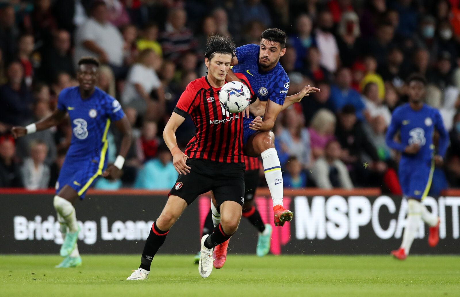 Soccer Football - Pre Season Friendly - AFC Bournemouth v Chelsea - Vitality Stadium, Bournemouth, Britain - July 27, 2021 Chelsea's Armando Broja in action with Bournemouth's Zeno Ibsen Rossi Action Images via Reuters/Peter Cziborra