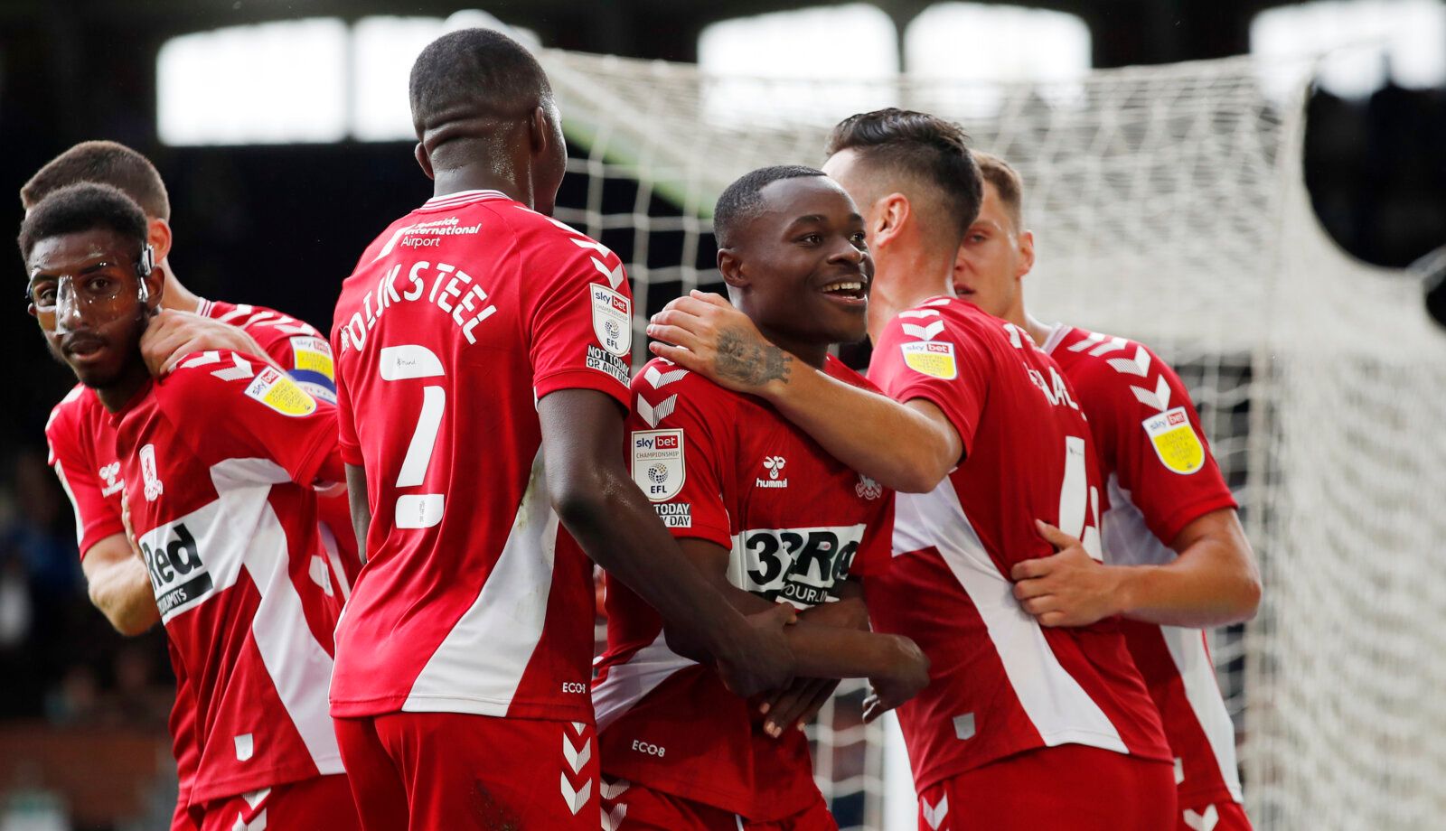 Soccer Football - Championship - Fulham v Middlesbrough - Craven Cottage, London, Britain - August 8, 2021 Middlesbrough's Marc Bola celebrates scoring their first goal with teammates Action Images/Andrew Couldridge