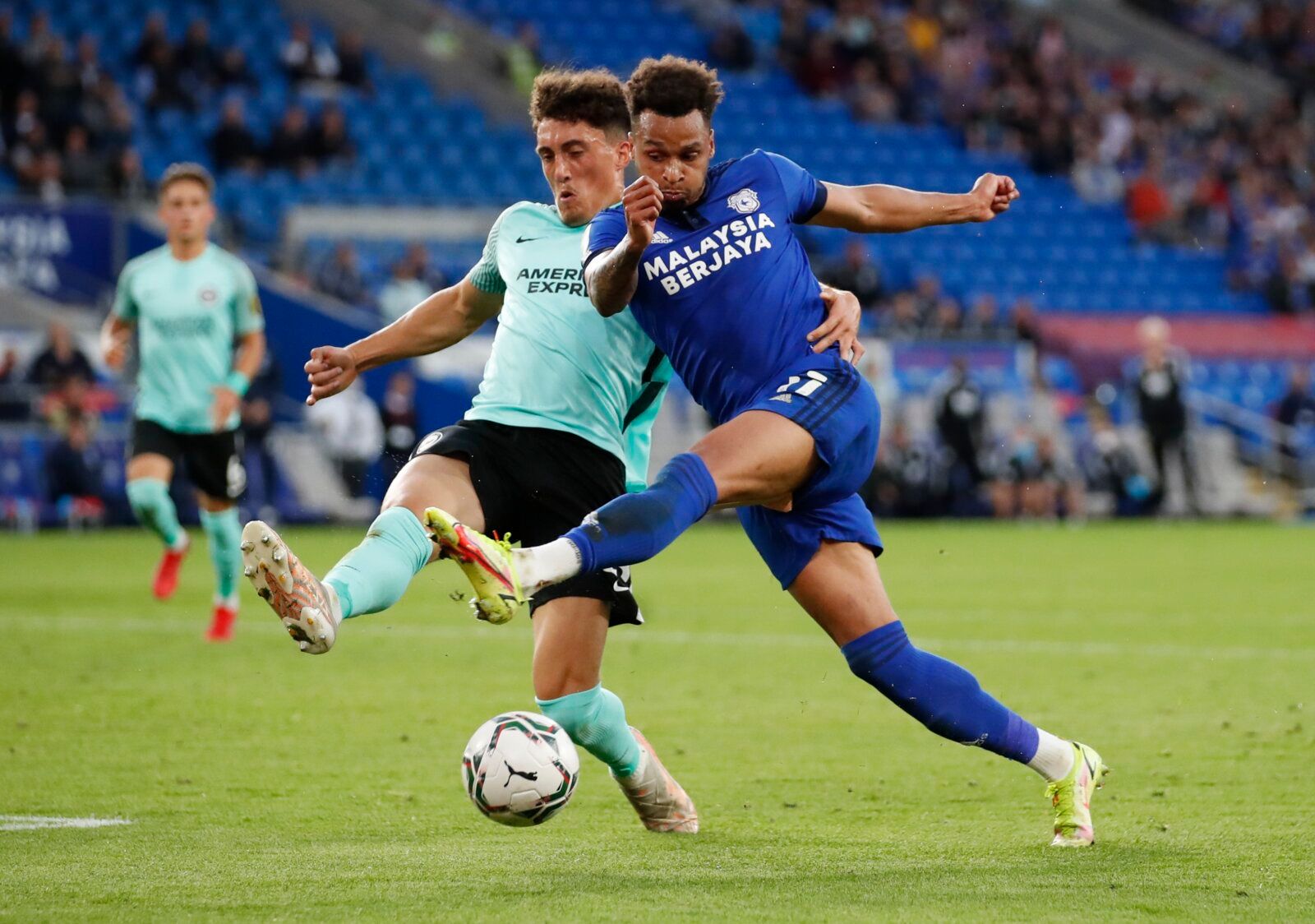Soccer - England - Carabao Cup Second Round - Cardiff City v Brighton & Hove Albion - Cardiff City Stadium, Cardiff, Britain - August 24, 2021 Cardiff City's Josh Murphy in action with Brighton & Hove Albion's Haydon Roberts Action Images via Reuters/Peter Cziborra