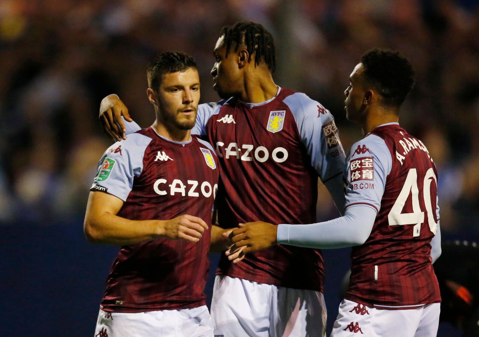 Soccer - England - Carabao Cup Second Round - Barrow v Aston Villa - Holker Street, Barrow-in-Furness, Britain - August 24, 2021 Aston Villa's Frederic Guilbert celebrates scoring their fifth goal with Caleb Chukwuemeka and Aaron Ramsey Action Images via Reuters/Ed Sykes