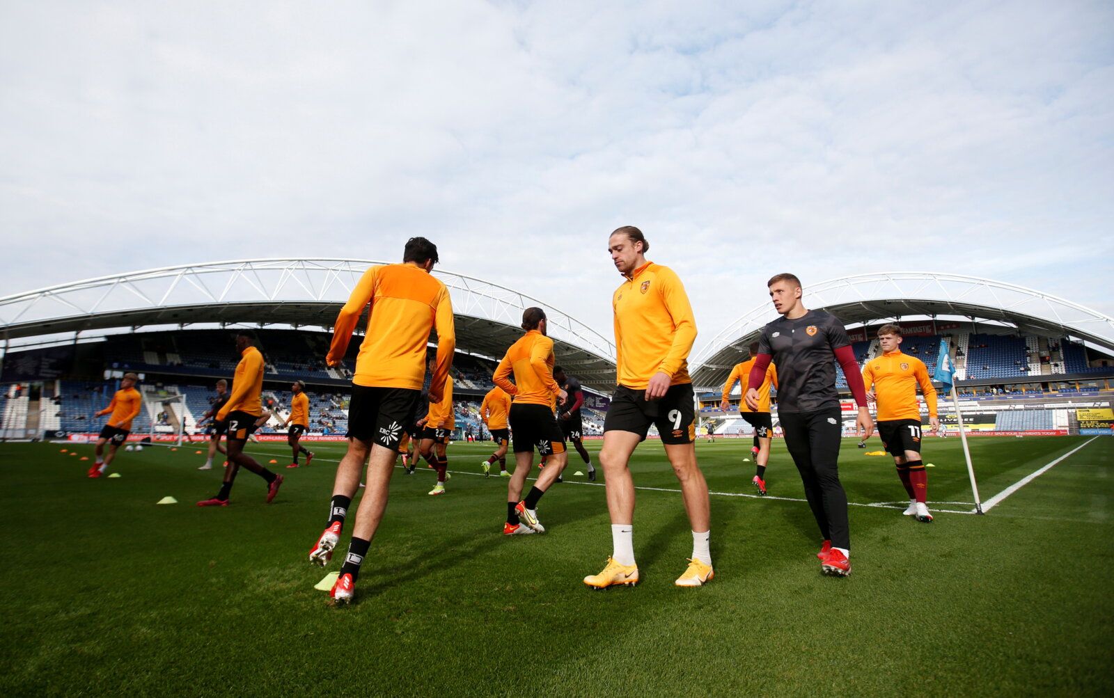Soccer Football - Championship - Huddersfield Town v Hull City - John Smith's Stadium, Huddersfield, Britain - October 16, 2021 Hull City players during the warm up before the match   Action Images/Ed Sykes  EDITORIAL USE ONLY. No use with unauthorized audio, video, data, fixture lists, club/league logos or 