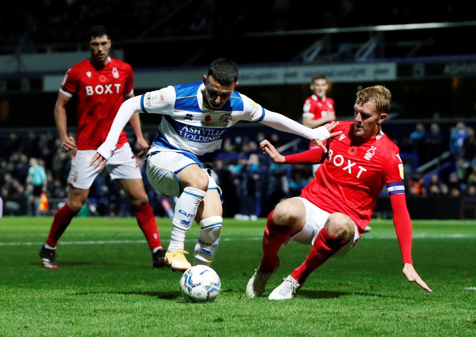 Soccer Football - Championship - Queens Park Rangers v Nottingham Forest - Loftus Road, London, Britain - October 29, 2021  Queens Park Rangers' Ilias Chair in action with Nottingham Forest's Joe Worrall   Action Images/Paul Childs  EDITORIAL USE ONLY. No use with unauthorized audio, video, data, fixture lists, club/league logos or 