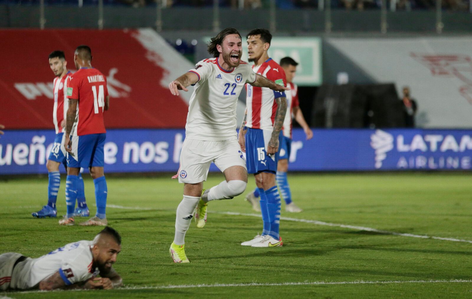 Soccer Football - World Cup - South American Qualifiers - Paraguay v Chile - Defensores del Chaco, Asuncion, Paraguay - November 11, 2021 Chile's Ben Brereton celebrates after Paraguay's Antony Silva scored an own goal and their first goal REUTERS/Cesar Olmedo