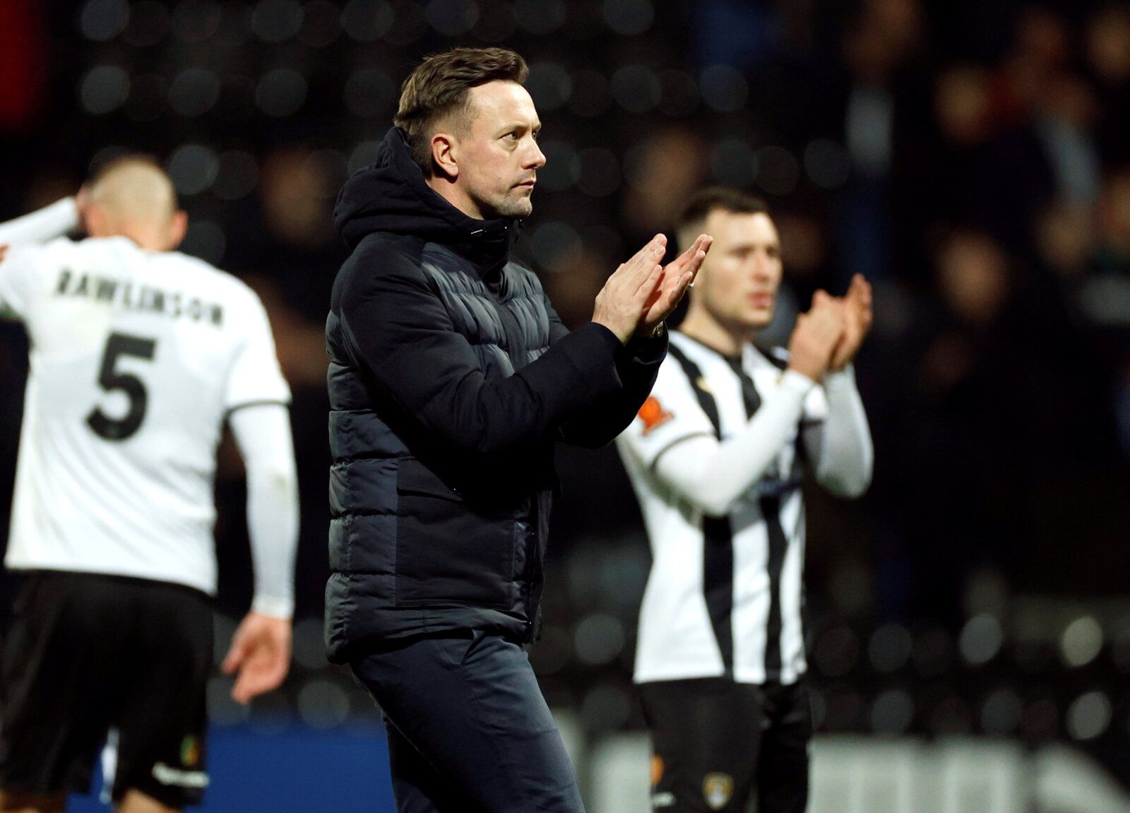 Soccer Football - FA Cup - FA Cup First Round Replay - Notts County v Rochdale - Meadow Lane, Nottingham, Britain - November 16, 2021 Notts County manager Ian Burchnall applauds fans after the match    Action Images/John Sibley