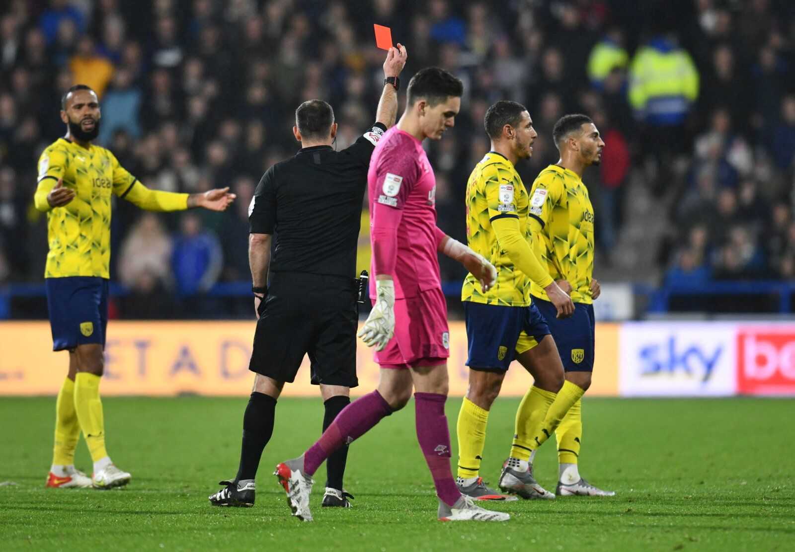 Soccer Football - Championship - Huddersfield Town v West Bromwich Albion - John Smith's Stadium, Huddersfield, Britain - November 20, 2021 West Bromwich Albion's Jake Livermore is shown the red card by referee Tim Robinson Paul Burrows/Action Images