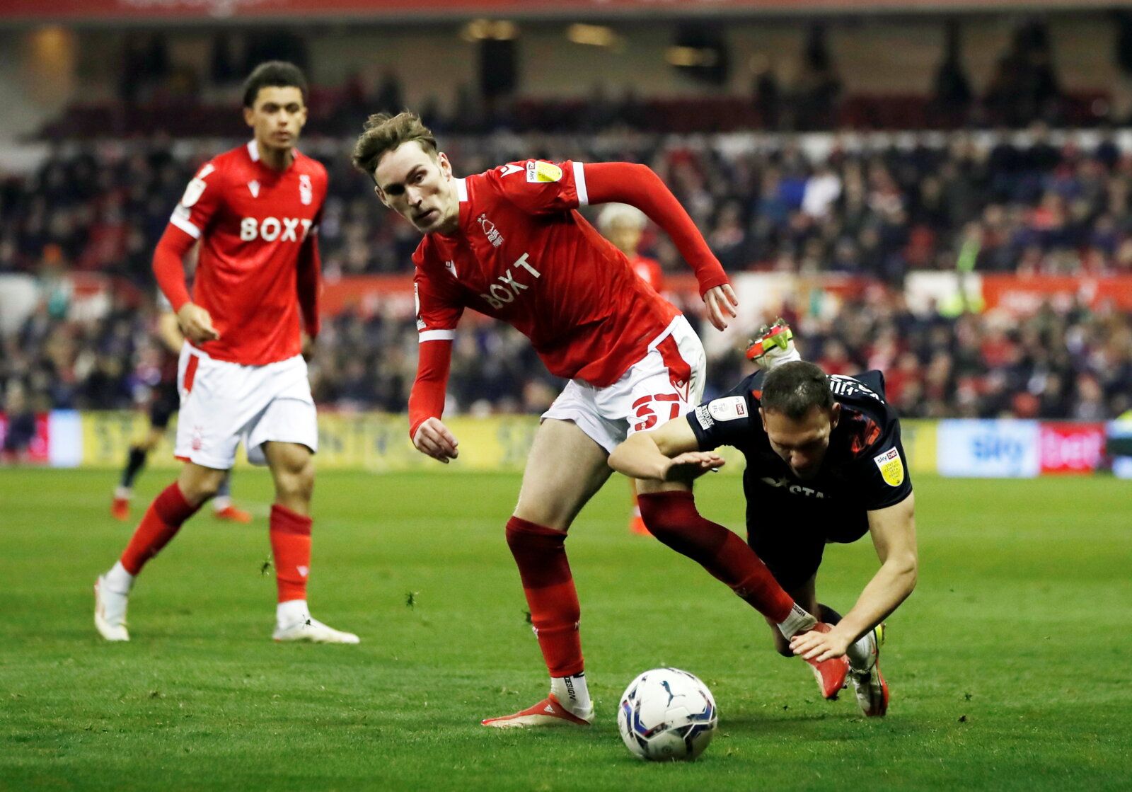Soccer Football - Championship - Nottingham Forest v Luton Town - The City Ground, Nottingham, Britain - November 23, 2021 Nottingham Forest's James Garner in action with Luton Town's Kal Naismith Action Images/Paul Childs