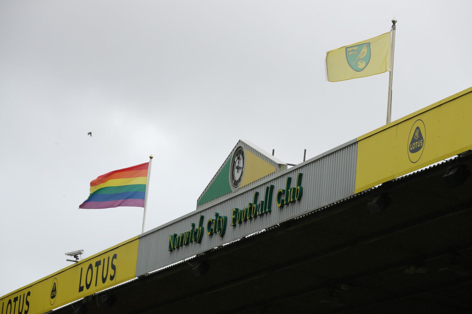 Soccer Football - Premier League - Norwich City v Wolverhampton Wanderers - Carrow Road, Norwich, Britain - November 27, 2021 General view of a rainbow flag on top of the stand in support of the Stonewall Rainbow Laces campaign before the match REUTERS/Chris Radburn EDITORIAL USE ONLY. No use with unauthorized audio, video, data, fixture lists, club/league logos or 'live' services. Online in-match use limited to 75 images, no video emulation. No use in betting, games or single club /league/playe