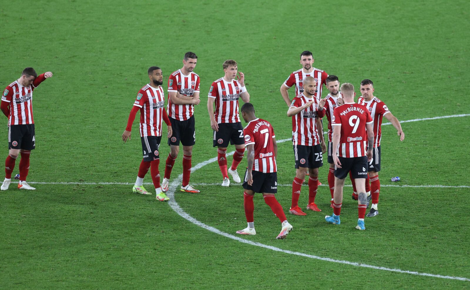 Soccer Football - Carabao Cup - Third Round - Sheffield United v Southampton - Bramall Lane, Sheffield, Britain - September 21, 2021 Sheffield United's Oliver McBurnie reacts with teammates after having his shot saved by Southampton's Fraser Forster during the penalty shoot out Action Images via Reuters/Lee Smith EDITORIAL USE ONLY. No use with unauthorized audio, video, data, fixture lists, club/league logos or 'live' services. Online in-match use limited to 75 images, no video emulation. No us