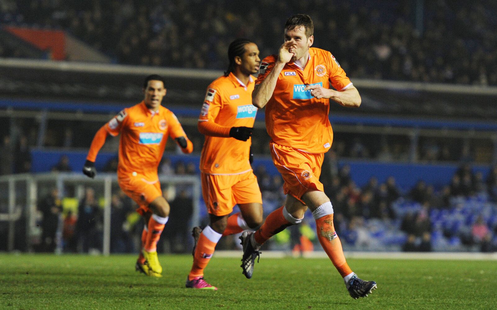 Football - Birmingham City v Blackpool - npower Football League Championship - St Andrews - 5/3/13 
Kirk Broadfoot (R) celebrates with team mates after scoring the first goal for Blackpool 
Mandatory Credit: Action Images / Alex Morton 
Livepic 
EDITORIAL USE ONLY. No use with unauthorized audio, video, data, fixture lists, club/league logos or live services. Online in-match use limited to 45 images, no video emulation. No use in betting, games or single club/league/player publications.  Please 