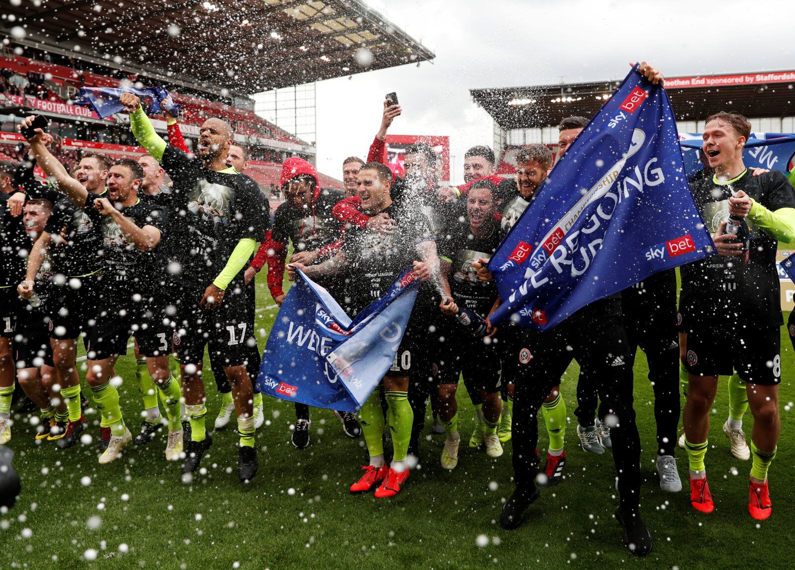 Soccer Football - Championship - Stoke City v Sheffield United - bet365 Stadium, Stoke-on-Trent, Britain - May 5, 2019   Sheffield United players celebrate promotion after the match     Action Images via Reuters/Lee Smith    EDITORIAL USE ONLY. No use with unauthorized audio, video, data, fixture lists, club/league logos or 
